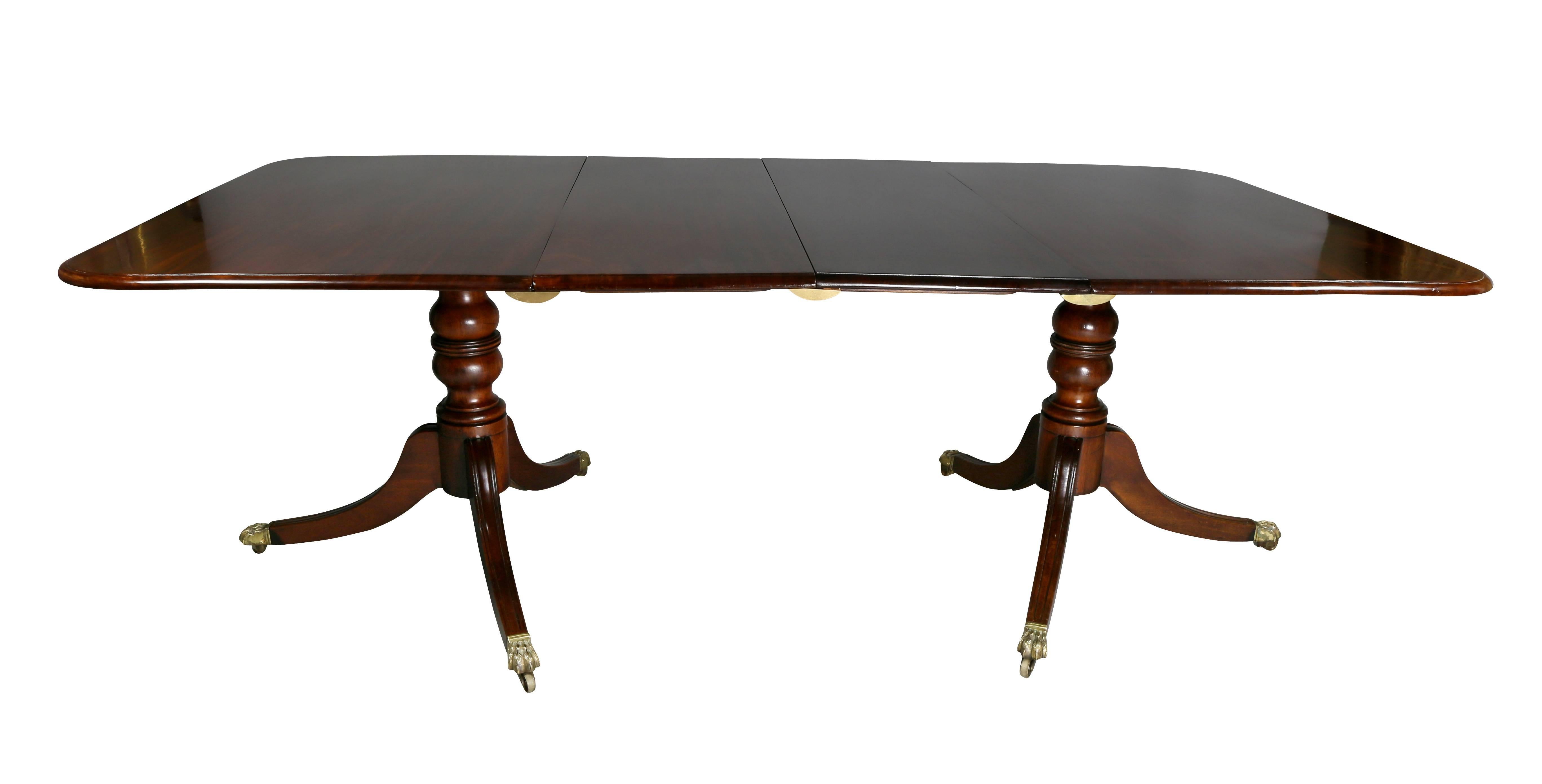 Rectangular top with molded edge. Including two leaves. Raised on turned supports ending on saber legs and casters.