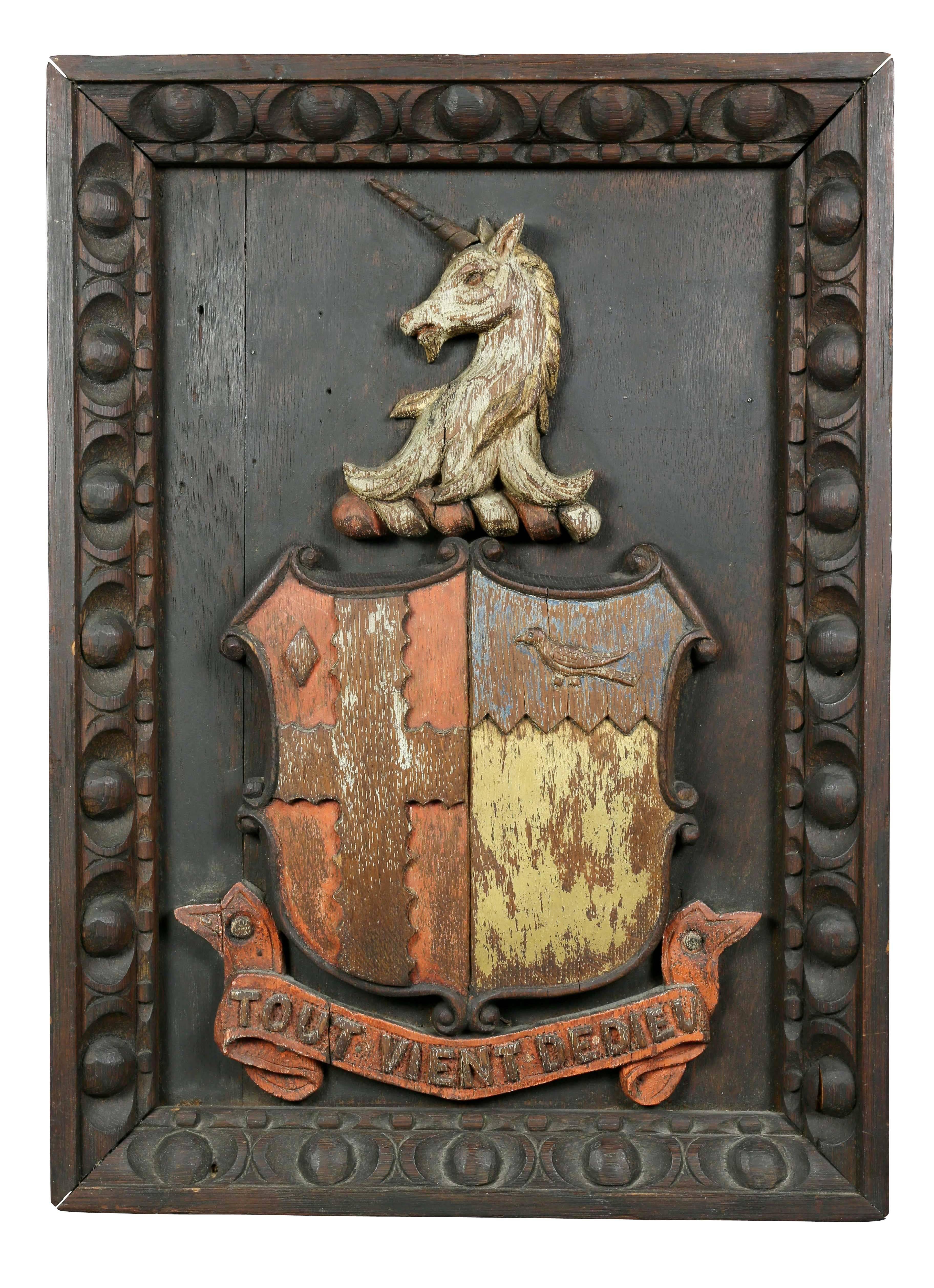 From the New York apartment of the designer Adolpho. Each with a shield with inscription and surmounted by a unicorn and feather plume and bird. Egg and dart frame.