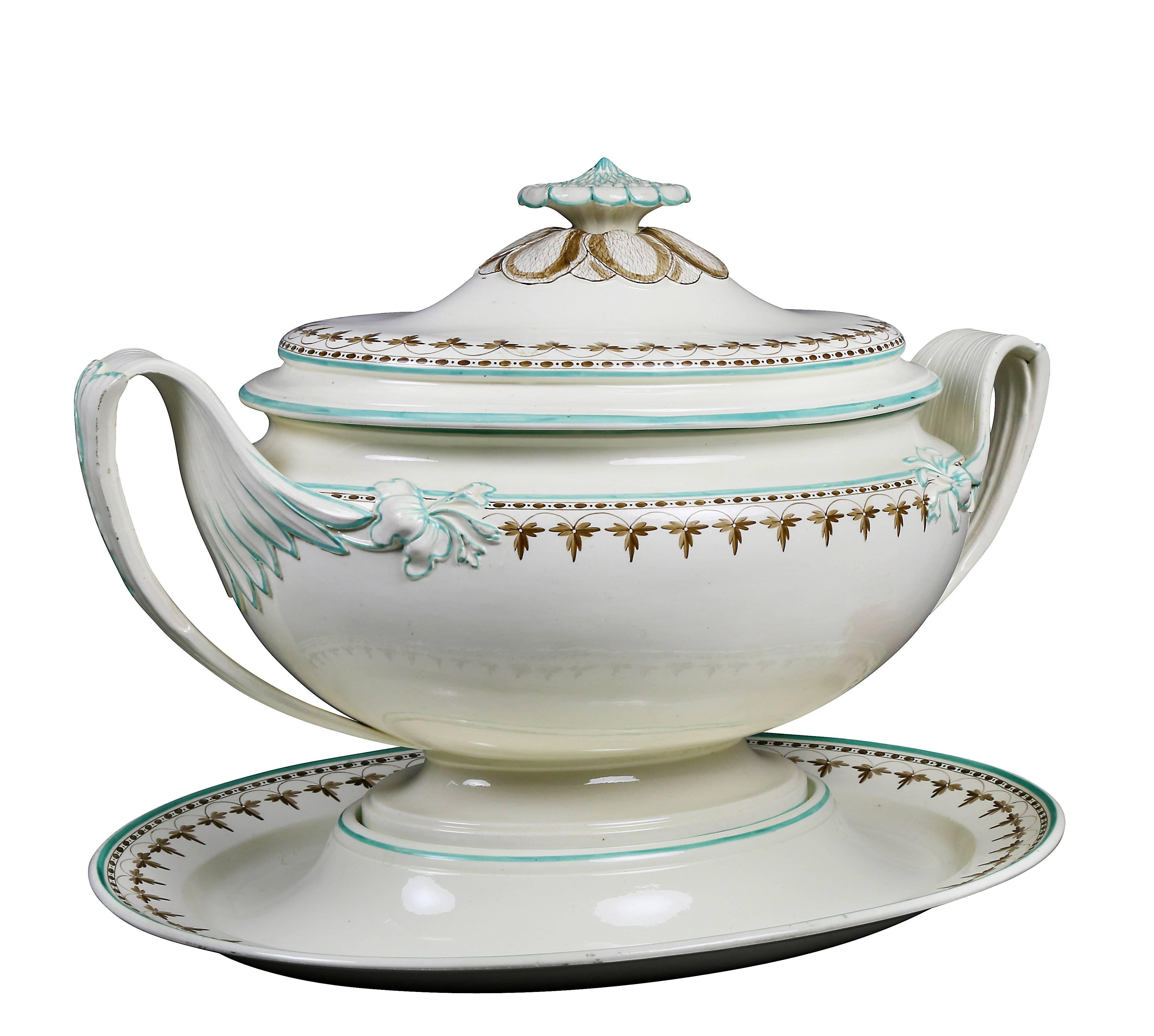 Impressed " Wedgwood ". Domed cover with leaf shape finial, conforming base with two loop handles with separate under tray.