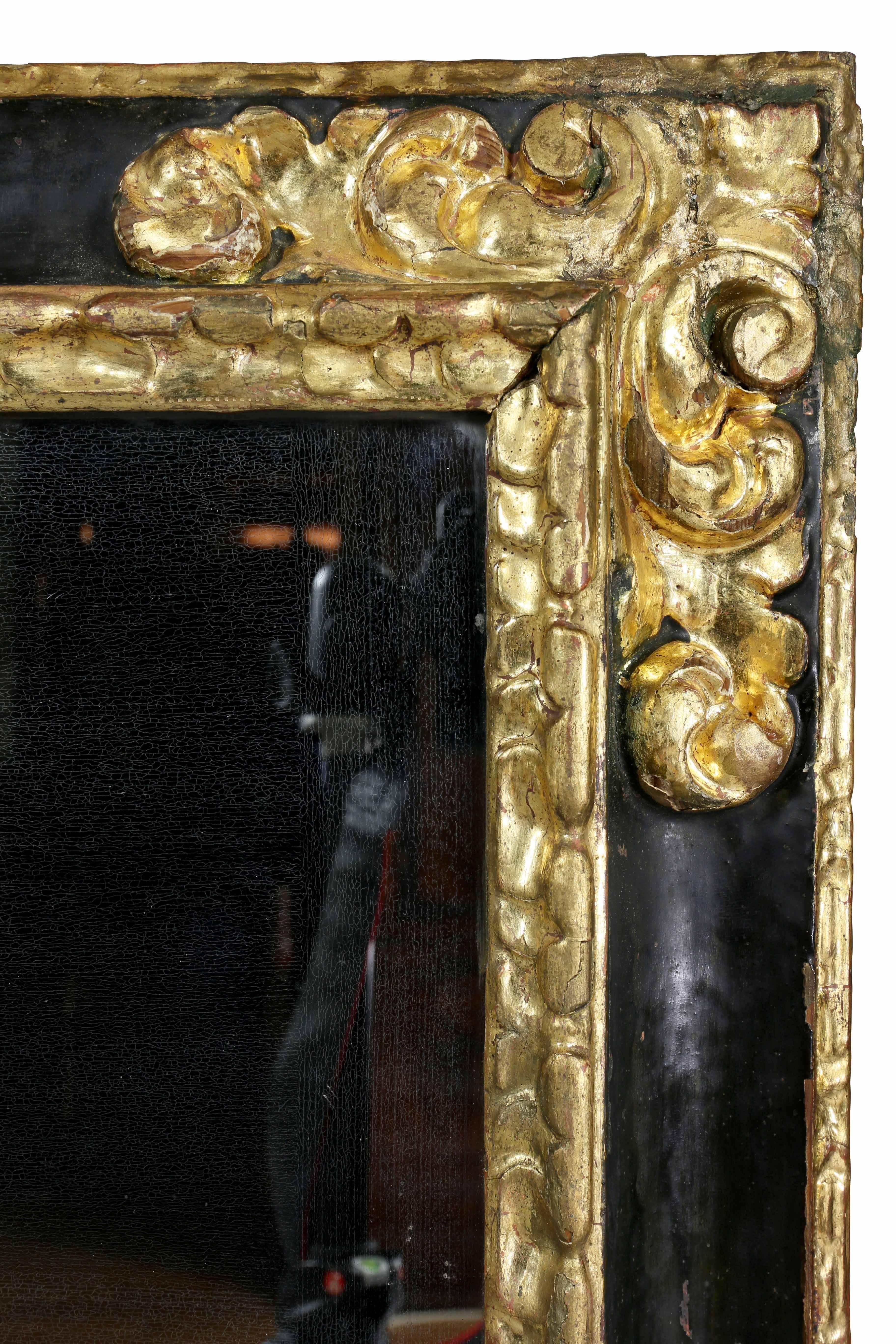 Early 18th Century Spanish Baroque Ebonized and Giltwood Mirror
