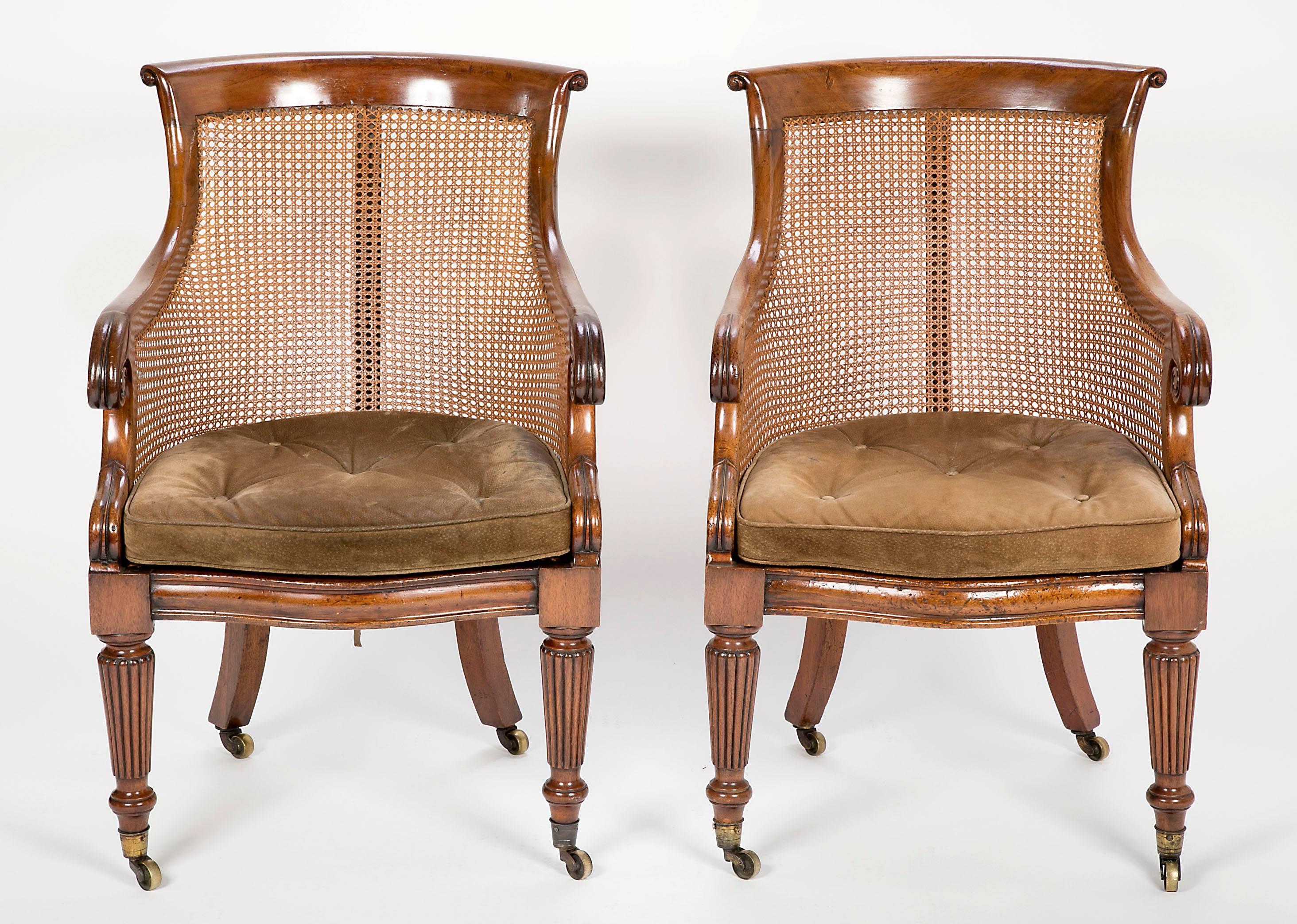 English Pair of Late Regency Mahogany and Caned Bergere Chairs