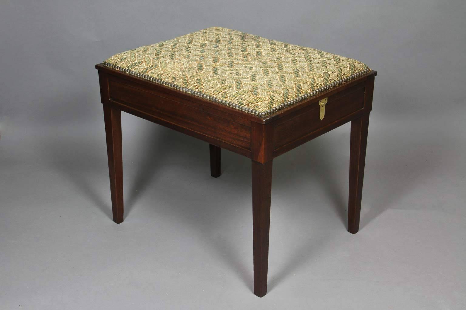 Hinged rectangular wool needlepoint seat opening to create a ladder.