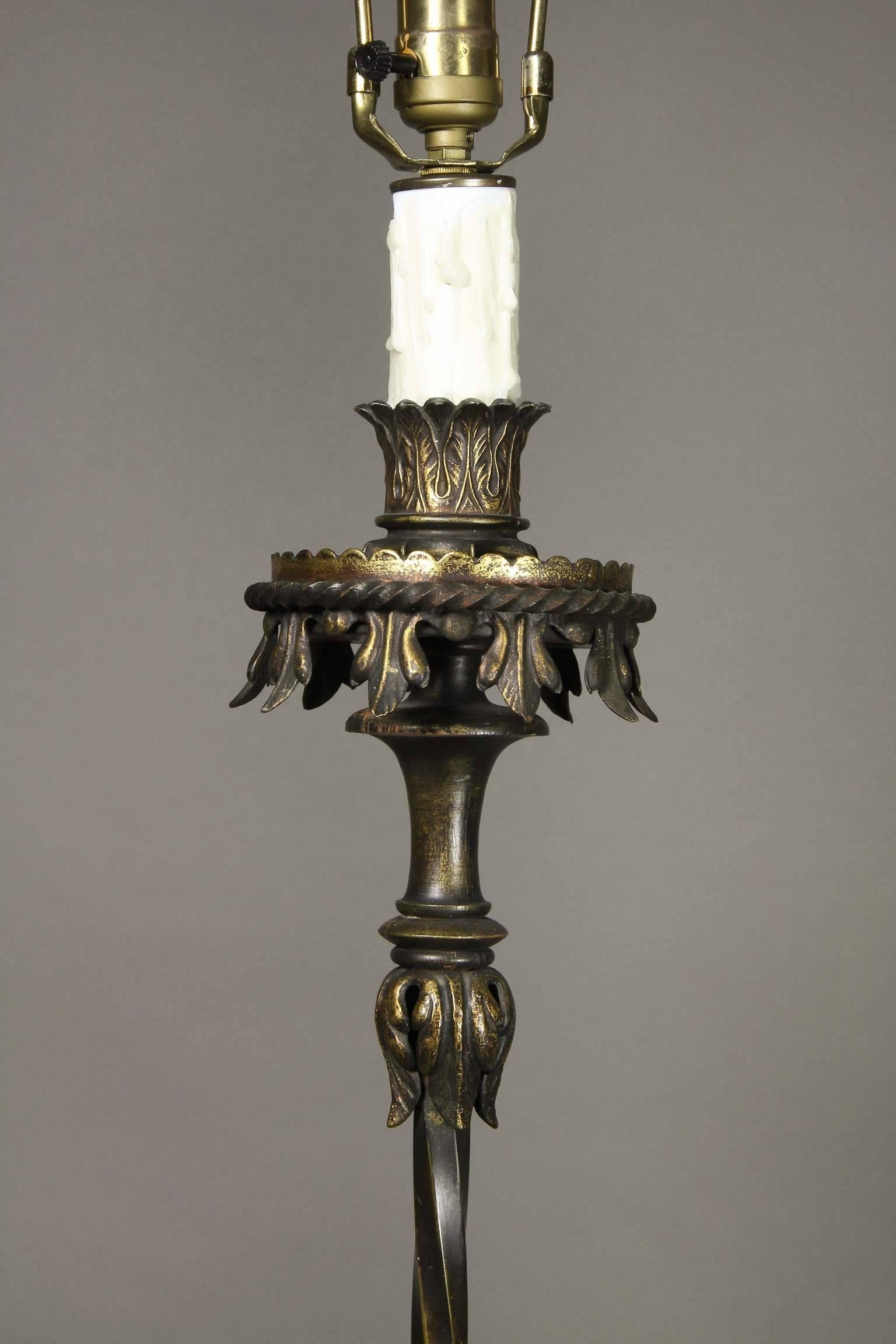 Each with one light socket , twist column terminating in weighted base in the form of four spaniels. Shades