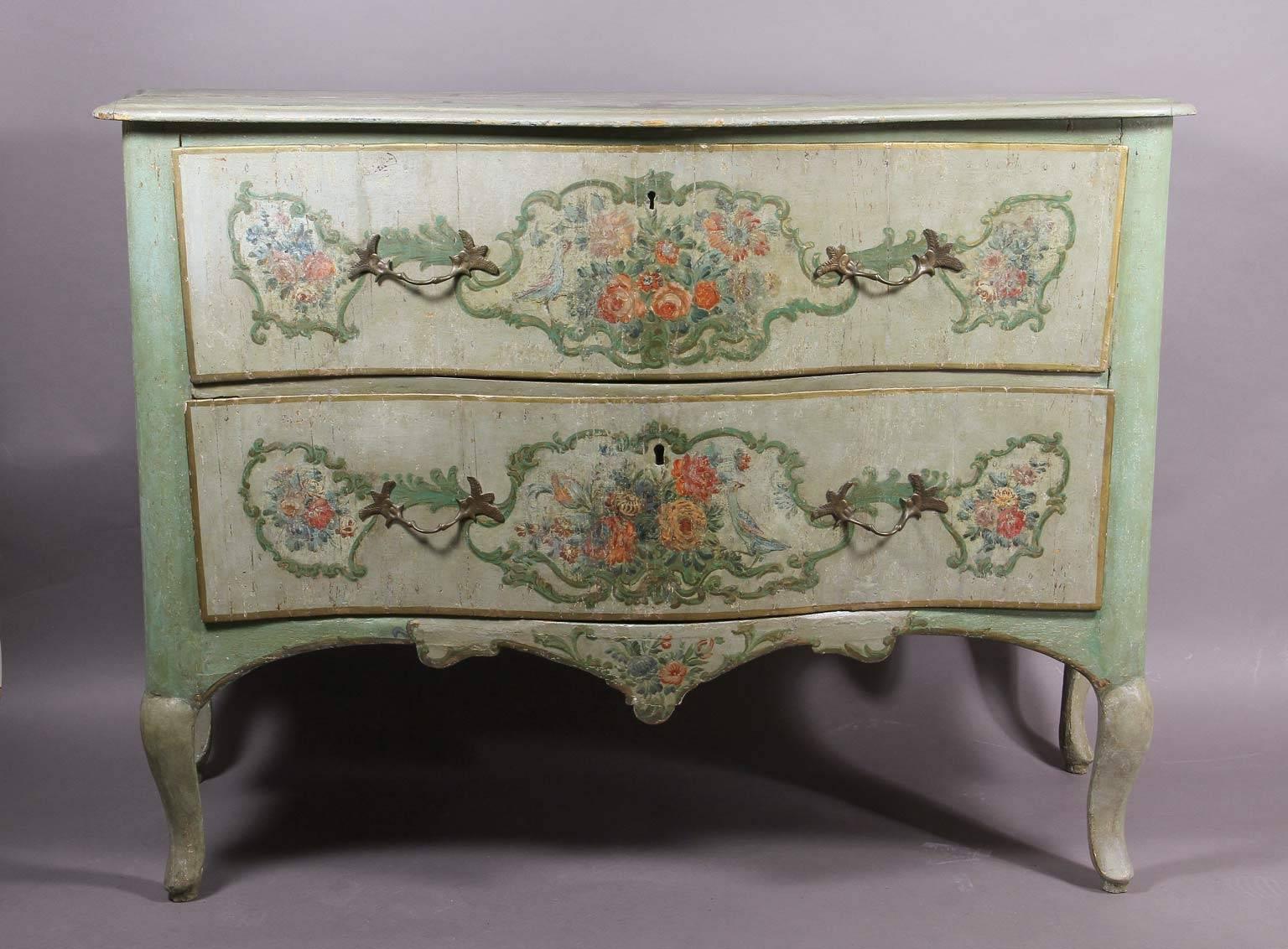 With serpentine top with outlines of old decoration over a conforming case with two drawers with painted floral scenes, the sides with similar decoration and shaped apron, raised on cabriole legs. Retains original painted surface.  In good condition