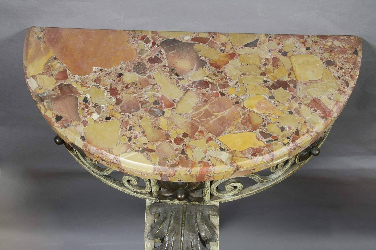 With D shaped breche de alep marble top with shaped edge over a conforming scroll and patinated bronzed rosette frieze supported on a monopodia base with bronzed acanthus leaf and trailing.