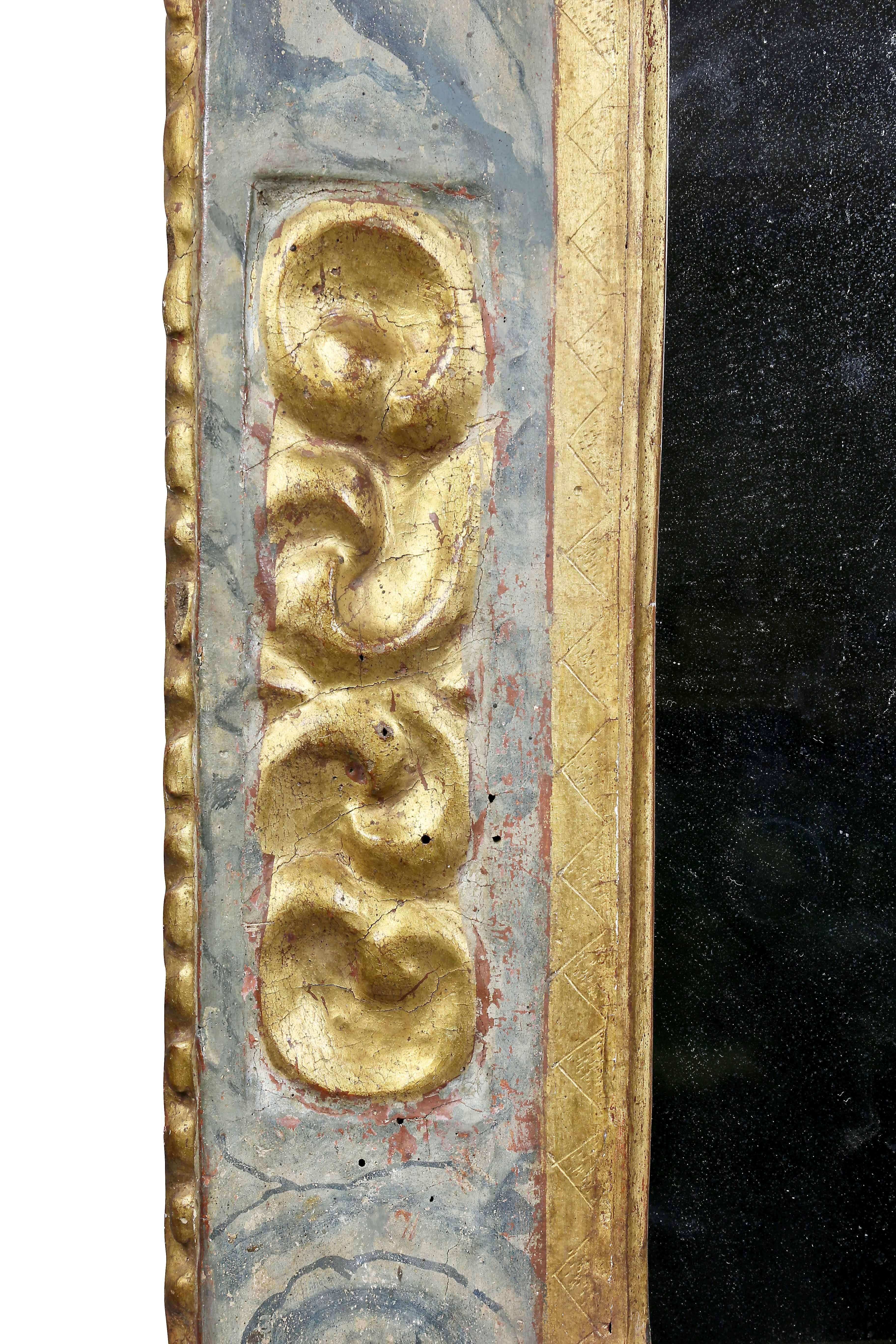 With wide frame with faux marble paint and gilded details.