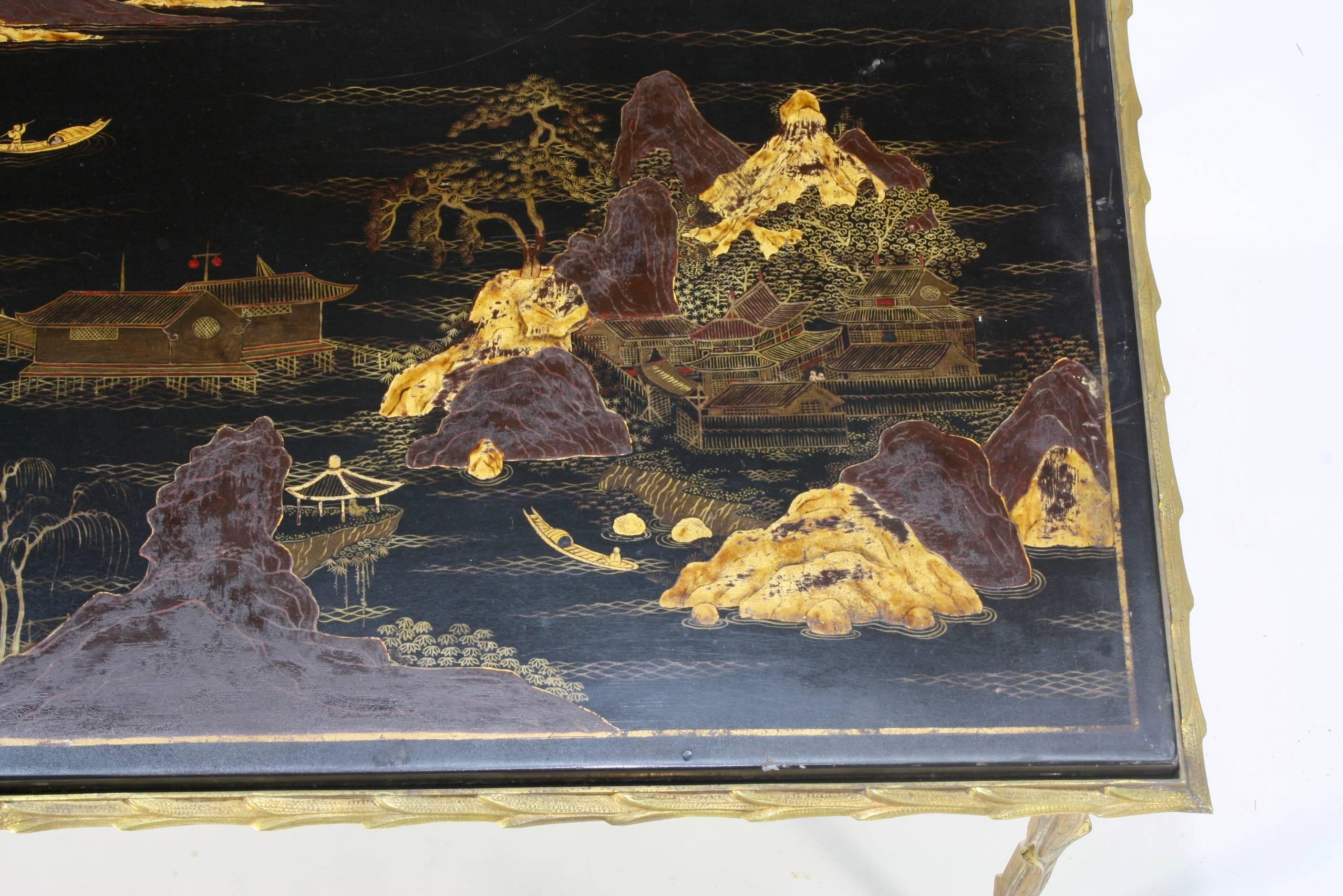 Gilt Black Lacquered Chinoiserie Coffee Table by Maison Baguès