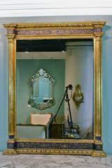 Impressive Renaissance Blue Painted and Parcel Gilt Mirror