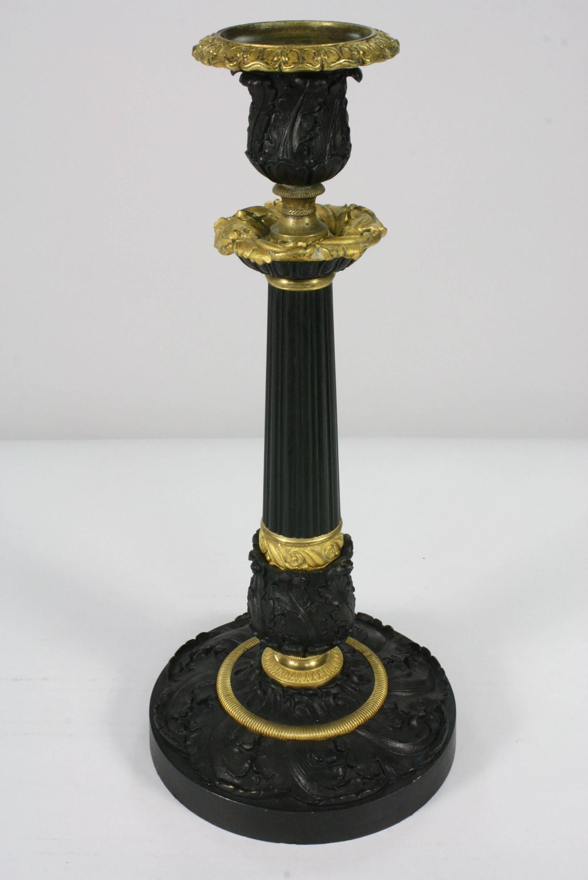 Gilt Pair of French Gilded and Patinated Bronze Candlesticks