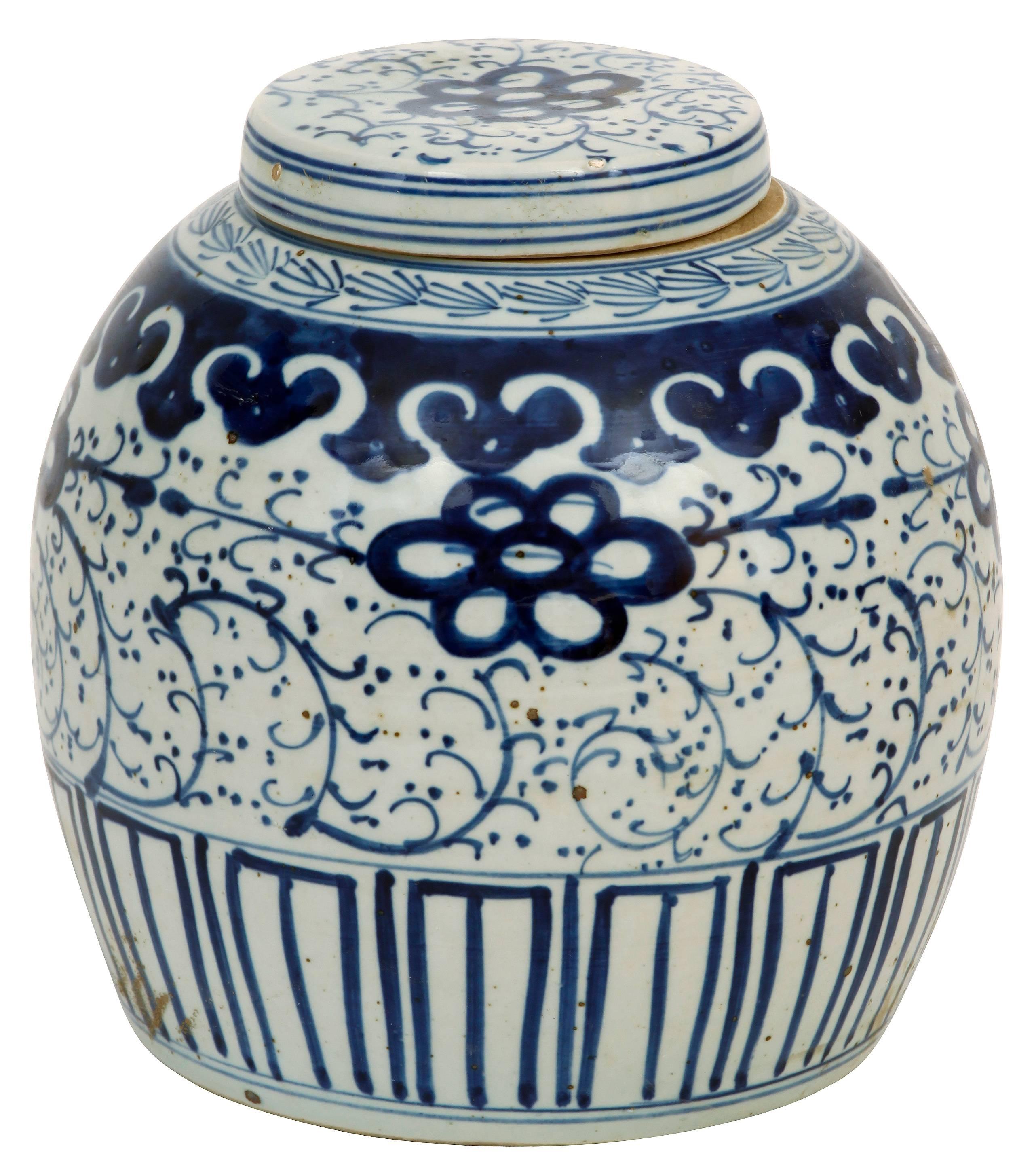 Blue and white is a Classic that will never go out of style. This pair of Chinese export jars with a lid have beautiful glazing and wonderful detail--perfect on a mantel, console or a centerpiece.