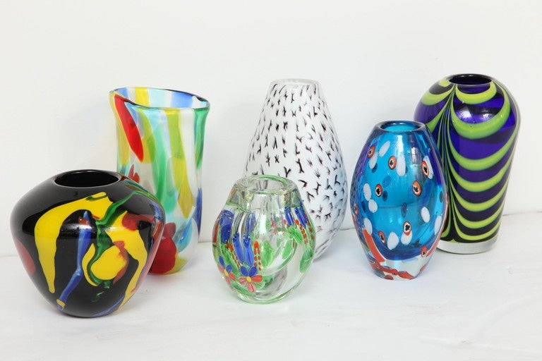 A series of colorful vases in Murano glass, the perfect finishing touch on a table or shelf. The vases range in size from 6 to 10 inches. Small vases are $550 each; larger vases are $650 each. Edit: Only small blue and green vase (middle) is left in