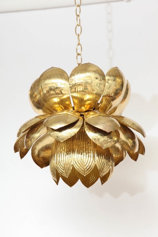 The wonderful patina and size of these lotus blossom pendants make them truly special. Great hung as a single, pair or trio, these beauties can make a statement in any room. The pendants, made up of four layers of leaves, have been newly rewired.