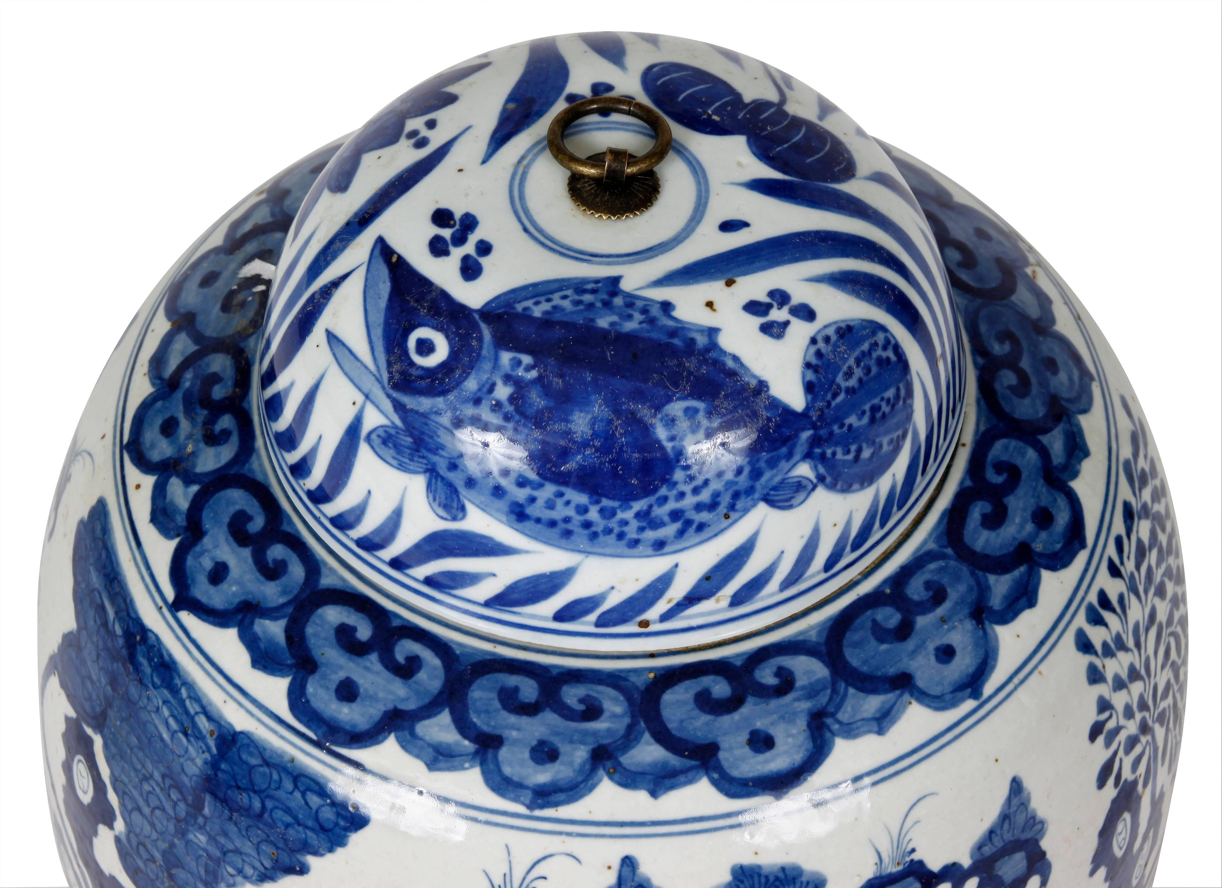 The beautiful deep blue color of this pair of ginger jars sets them apart from others. These beauties, depicting a wonderfully detailed scene, can flank a fireplace, accessorize a console table, or serve as vases. Blue and white will never go out of