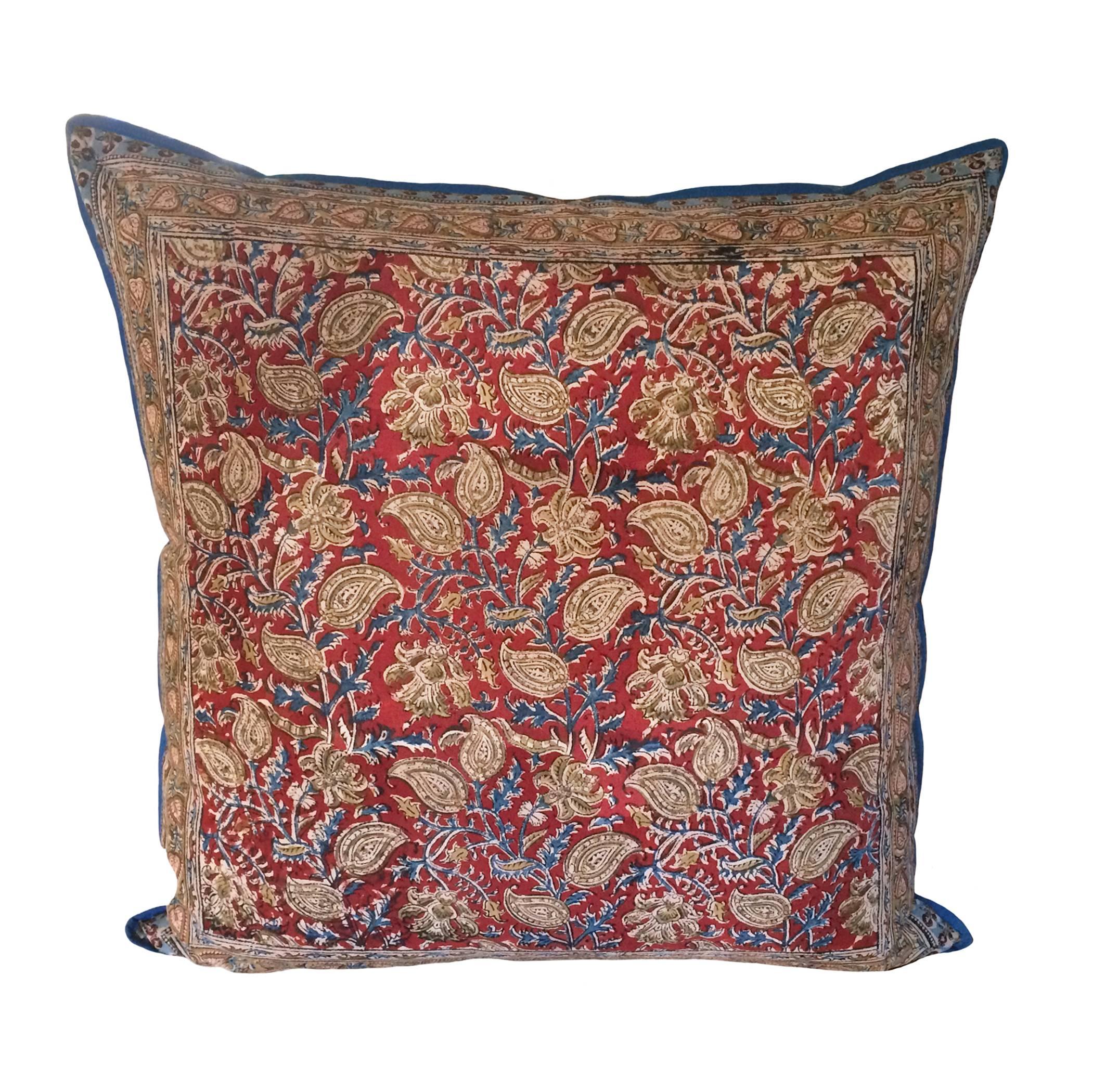 Pair of Indian batik pillows; burgundy, beige, blue paisley with borders; Mid-Century. Differing patterns on each side.