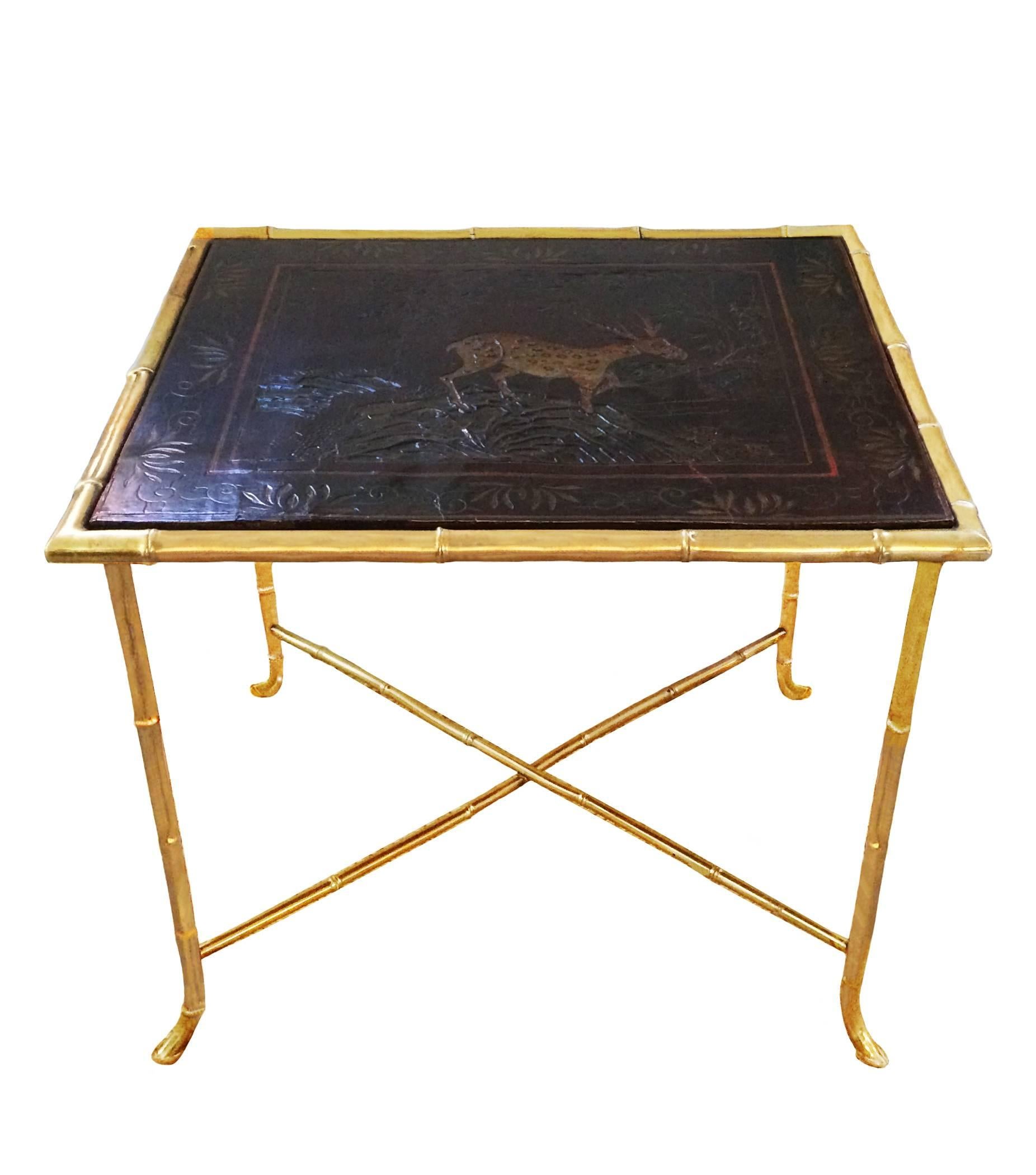 Pair of unique Chinoiserie Lacquer Tables
 
A unique pair of custom French Chinoiserie Brass Bamboo framed bases; 20th Century - made expressly for the Coromandel Lacquer Screen Panel insets; Circa  1840.
Fabulous cocktail tables or use side by side