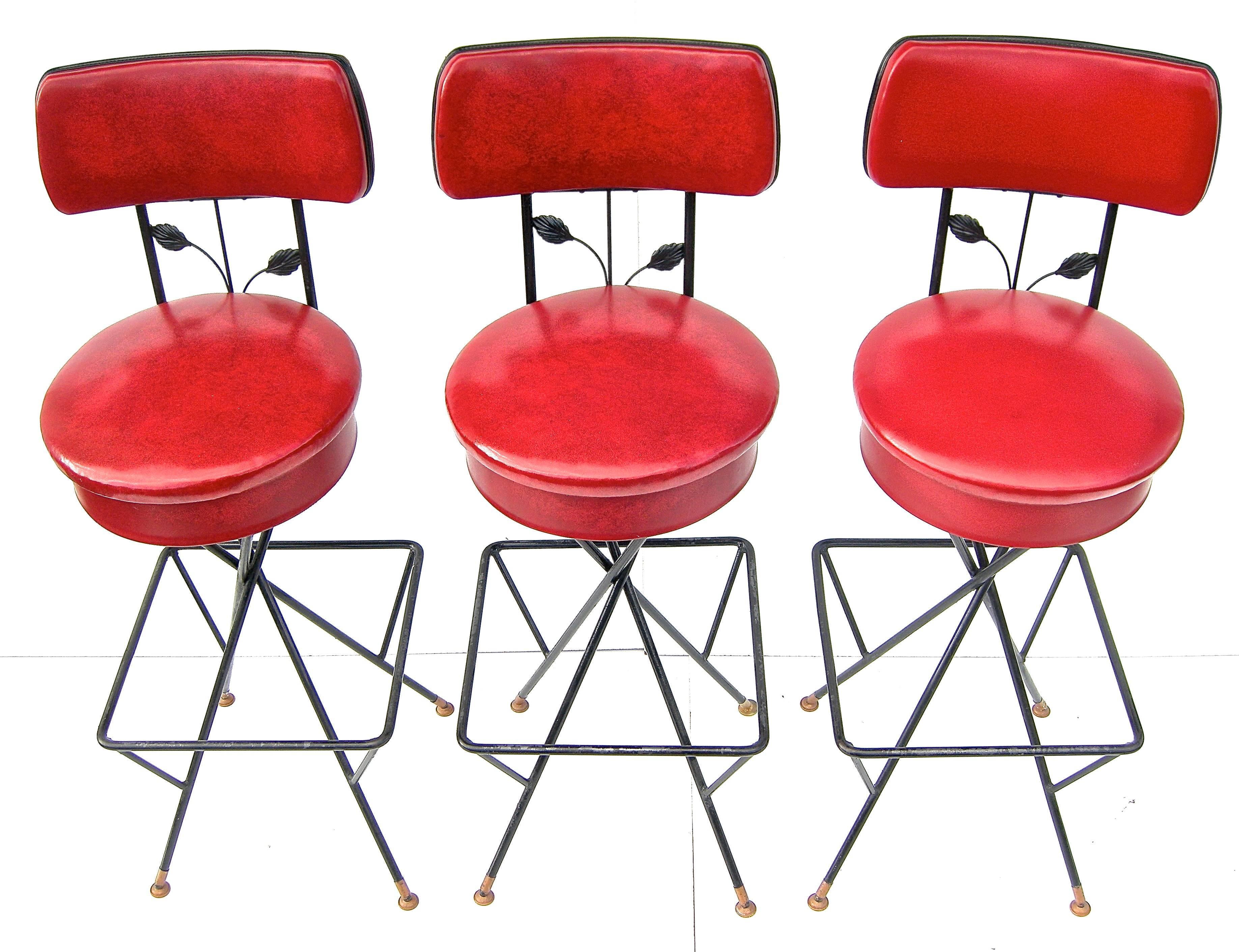 Delightful trio of vintage, swivel, bar stools having whimsical 