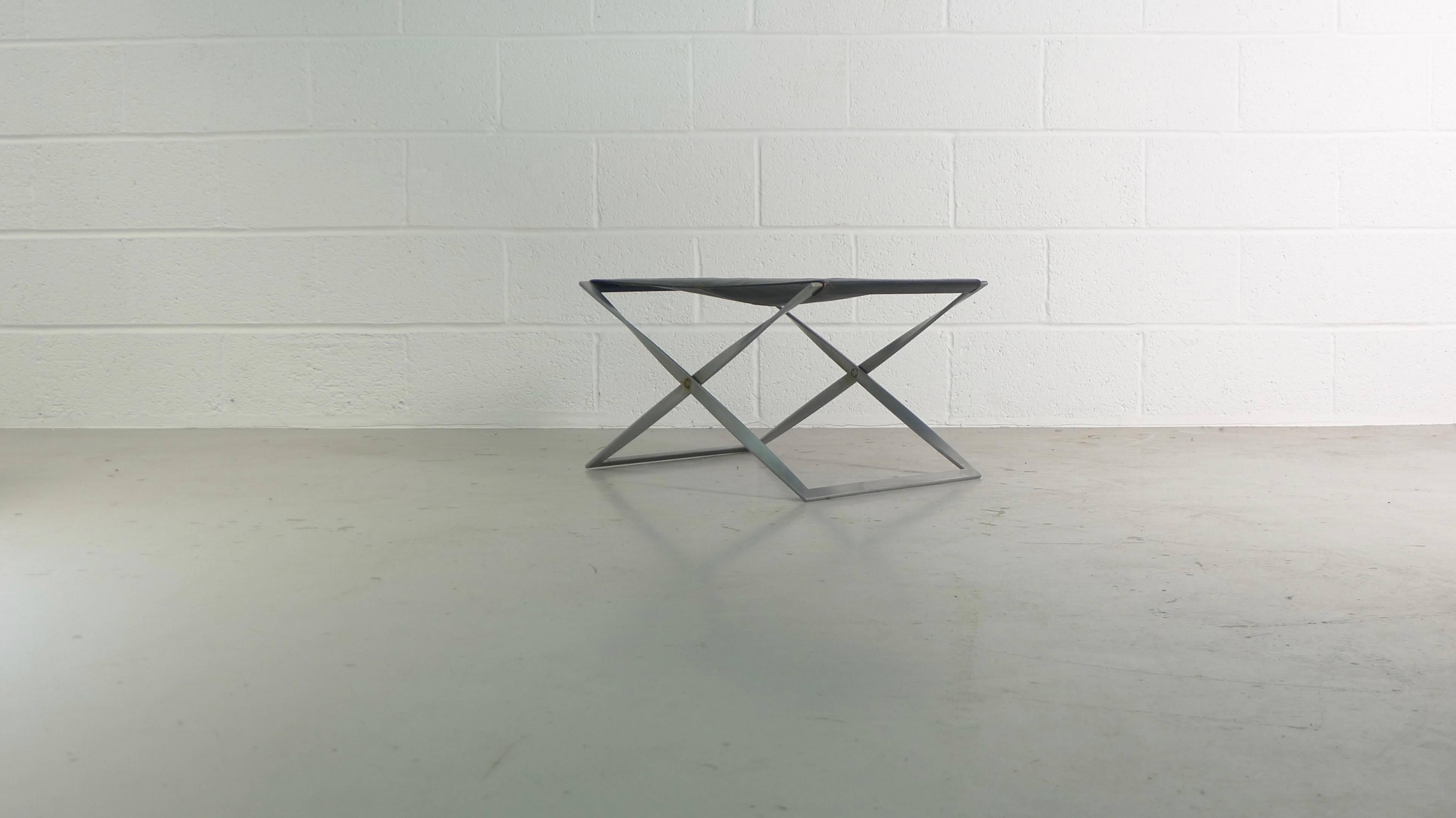 Poul Kjaerholm for E Kold Christensen, Denmark, 1961. A model PK91 folding stool of nickel-plated steel and original black leather. 

Clearly stamped by maker and in excellent vinatge condition.