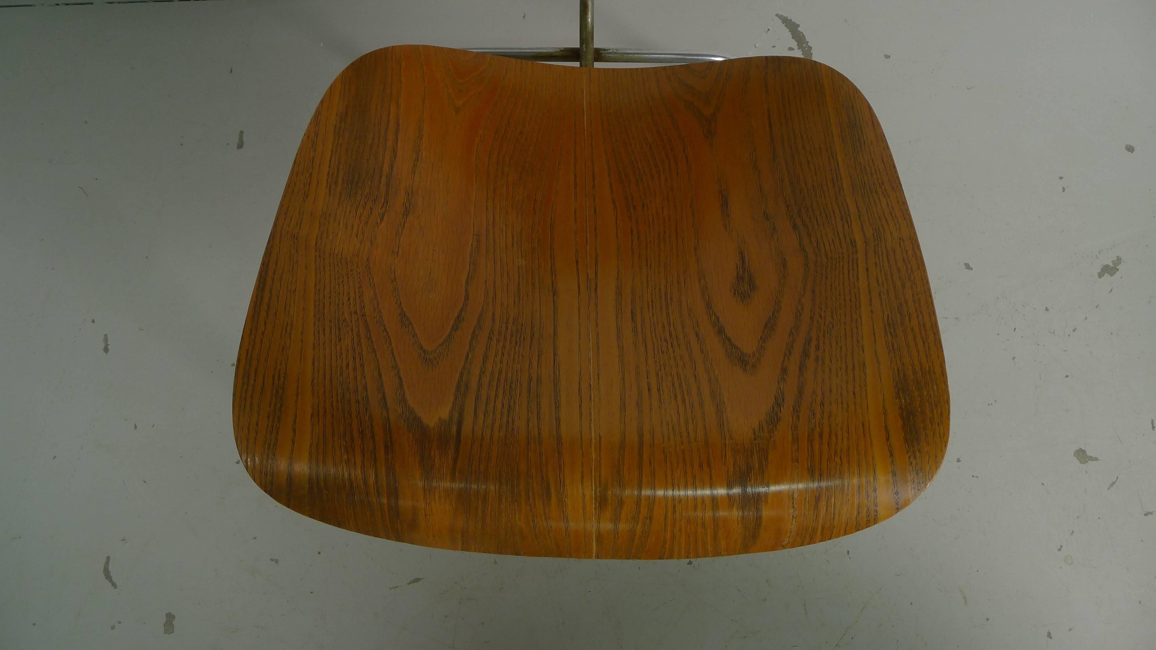 Charles and Ray Eames for Herman Miller, USA, 1950s. An early production pair of LCM (lounge chair metal) chairs. Metal frames and plywood seats and backs, from the original owner and accompanying CTM also available . 

No chips or damage,