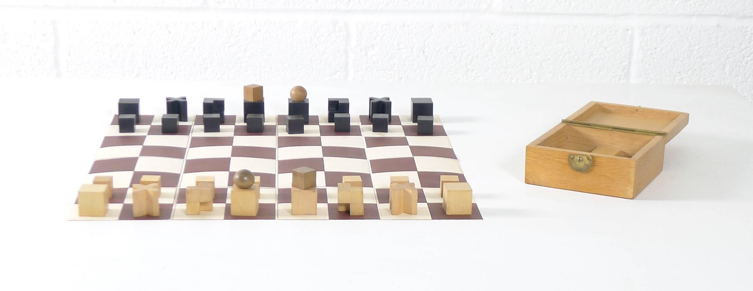 Josef Hartwig (1880-1956), Bauhaus chess set designed in 1923 and in production for approx. 7 years. Hartwig was head of the stone and wood sculpture workshop at the Weimar Bauhaus from 1921-1925, this Chess set embodies the schools tenet of 