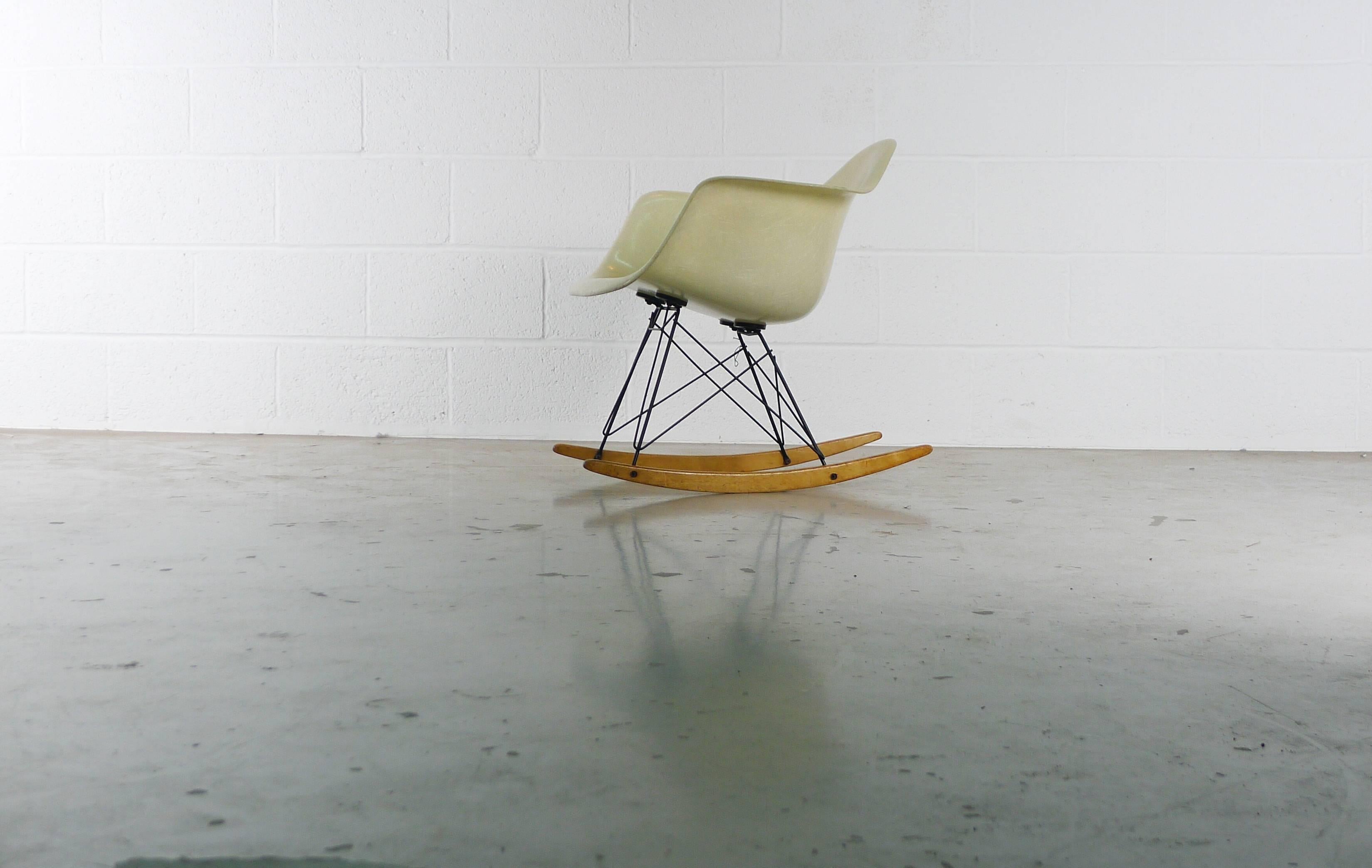 Charles and Ray Eames for Herman Miller, USA, circa 1950. An exceptional rope edge rocker (RAR), with lemon yellow arm shell over it's original base. There is no shockmount bleedthrough, strong visible swirling fibers, all original hardware,