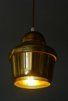 Alvar Aalto, Golden Bell pendant light, model A330, made by Valaistustyö, 1950s