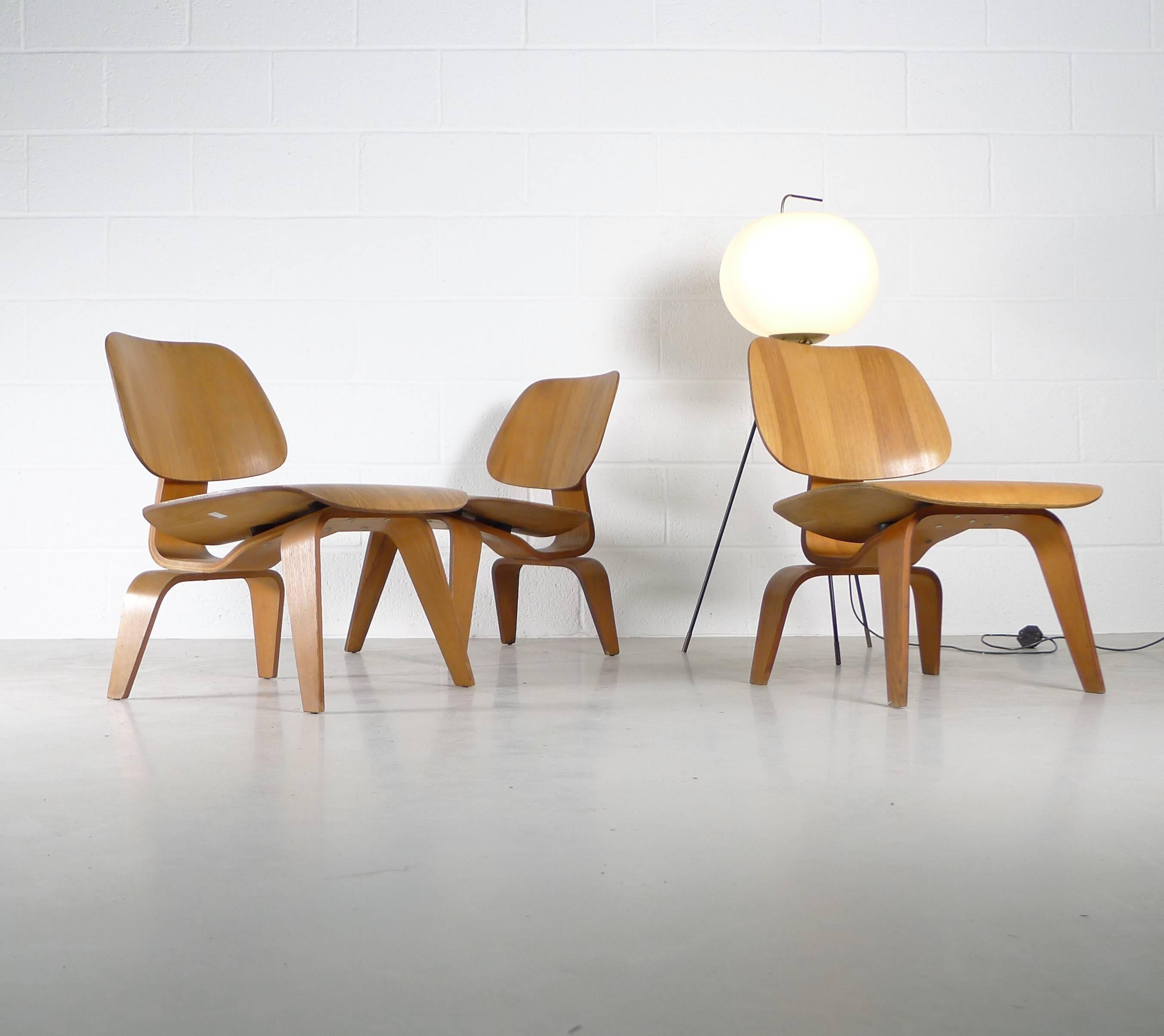 Charles and Ray Eames for Evans/Herman Miller, USA. An LCW (lounge chair wood) in ash. Currently three in stock, one has the earlier 5-2-5 screw pattern and likely dates, circa 1950, the other two have the 4-2-4 screw pattern and are circa