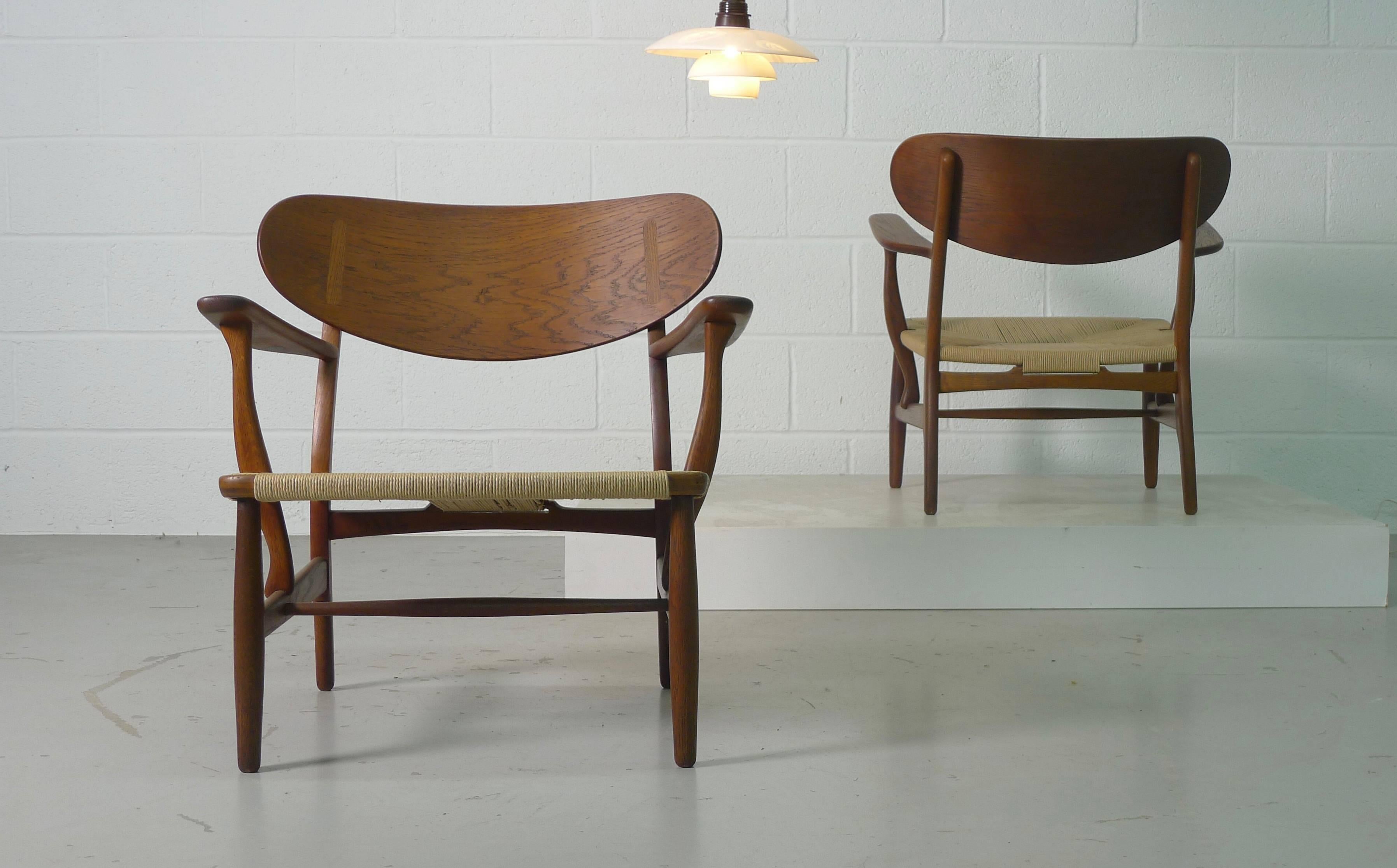 Mid-20th Century Hans Wegner for Carl Hansen, Denmark, Pair of CH22 Armchairs, 1950s