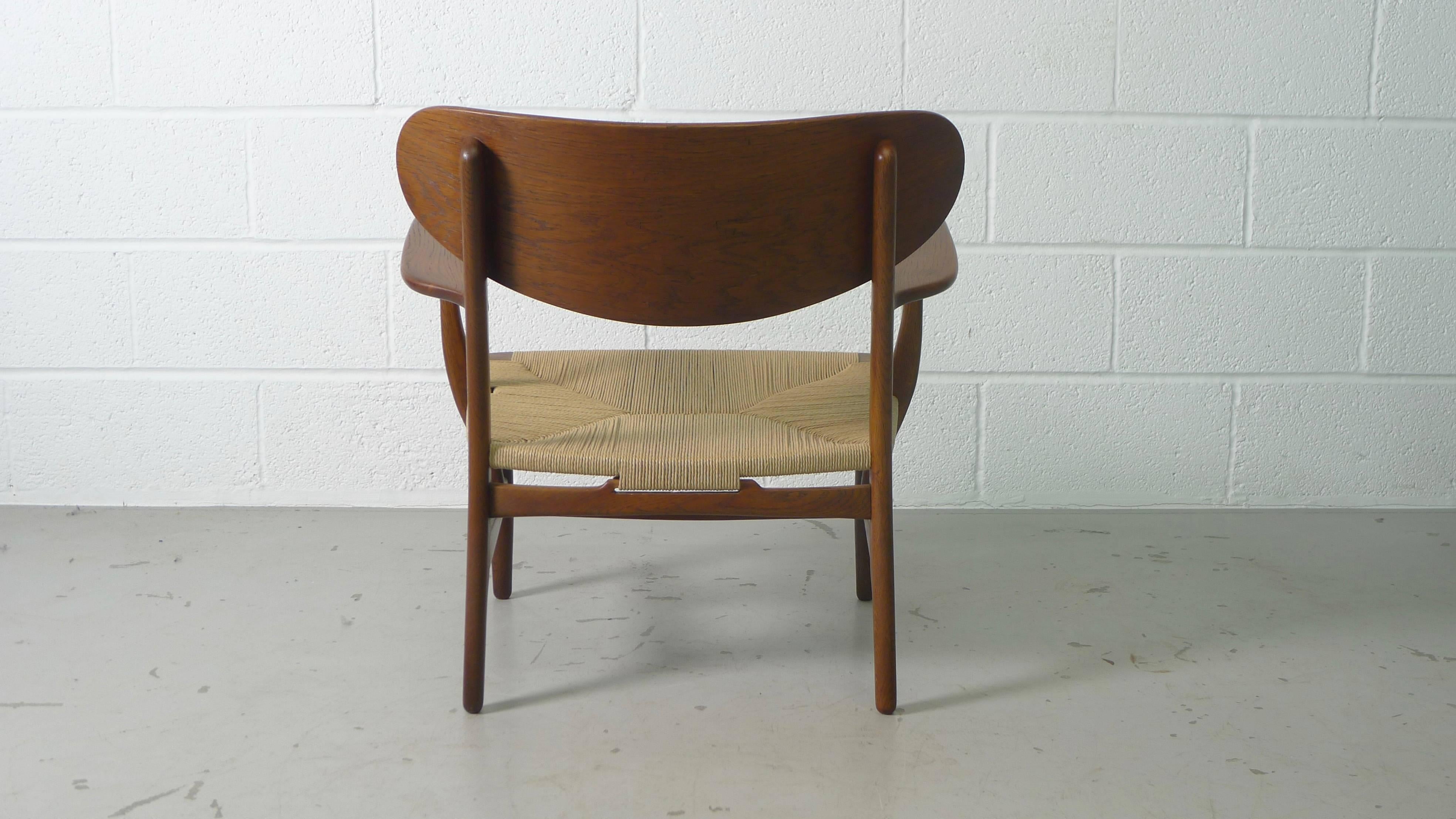 Hans Wegner for Carl Hansen, Denmark, Pair of CH22 Armchairs, 1950s 4