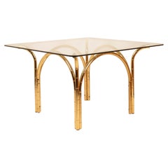 Mesa de comedor «Mediterrean Italian» de acero chapado en latón, con efecto bambú y tablero de cristal