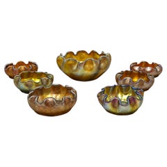 Juego de siete piezas de cristal Favrile de Louis Comfort Tiffany: cuenco para frutos secos y salero