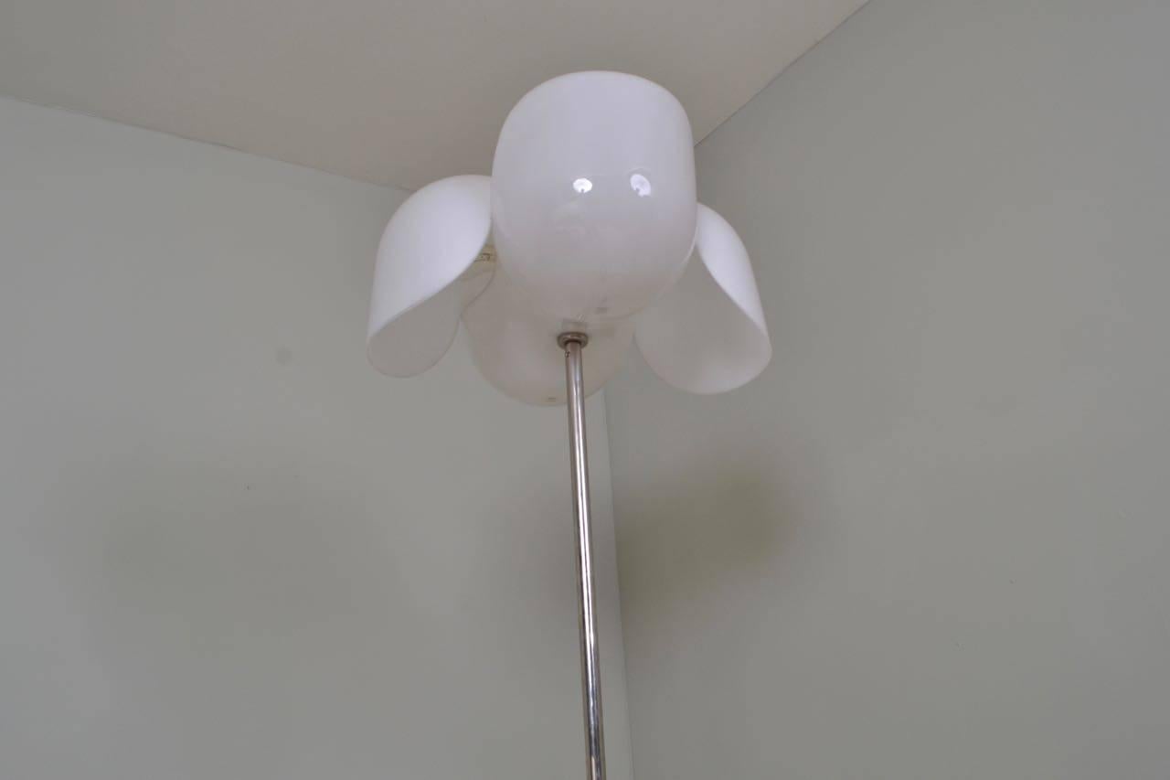 Floor lamp designed by Olaf von Bohr and manufactured by Valenti.
White perspex flower shade made in two parts. Chromed steel pole 
and white enameled metal base.
Gives a very nice diffused light through the perspex shade.
 