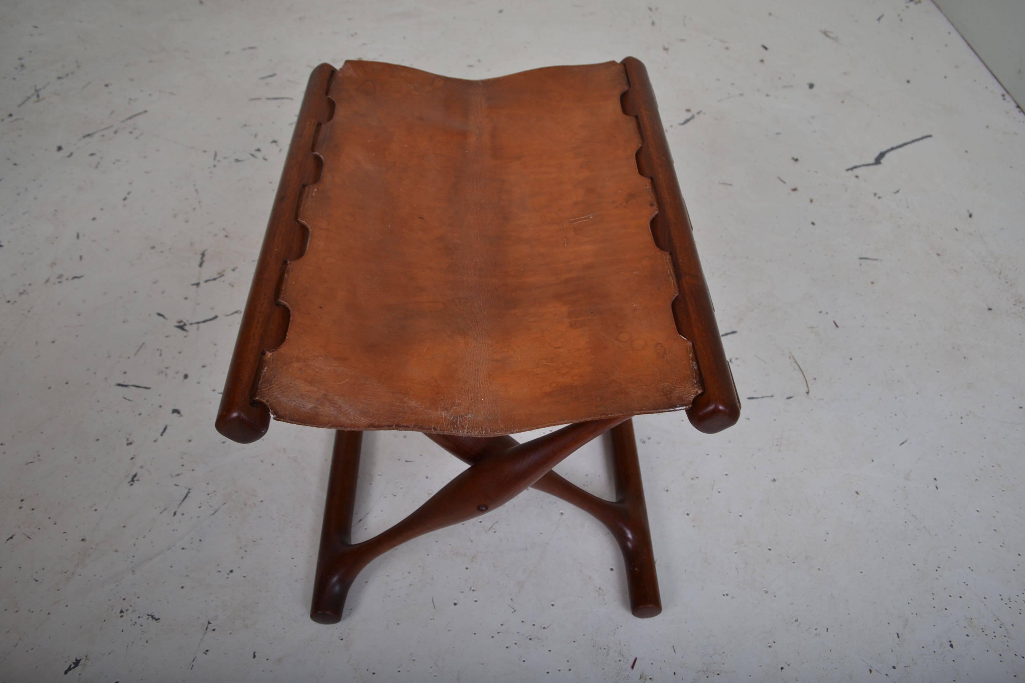 Teak and cognac leather 