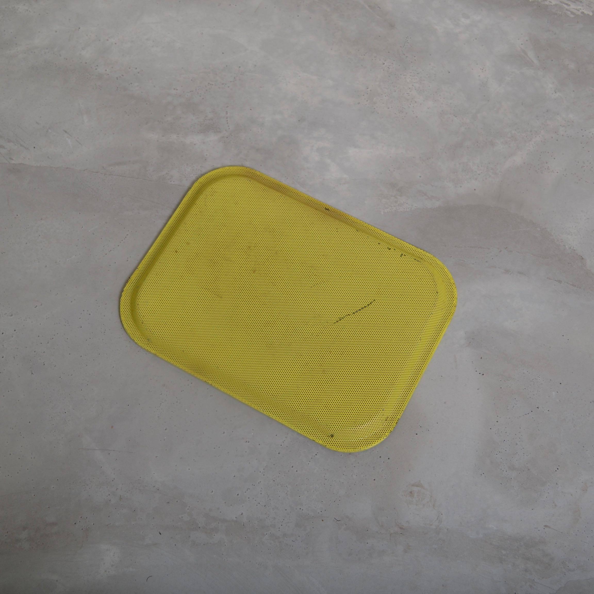 Die cut metal serving tray designed by Mathieu Matégot
and produced by Mategot products, France, circa 1950
Finished in original yellow lacquer.