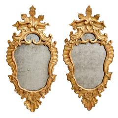 Pair of Carved Giltwood Venetian Shield Shaped Mirrors, 18th Century