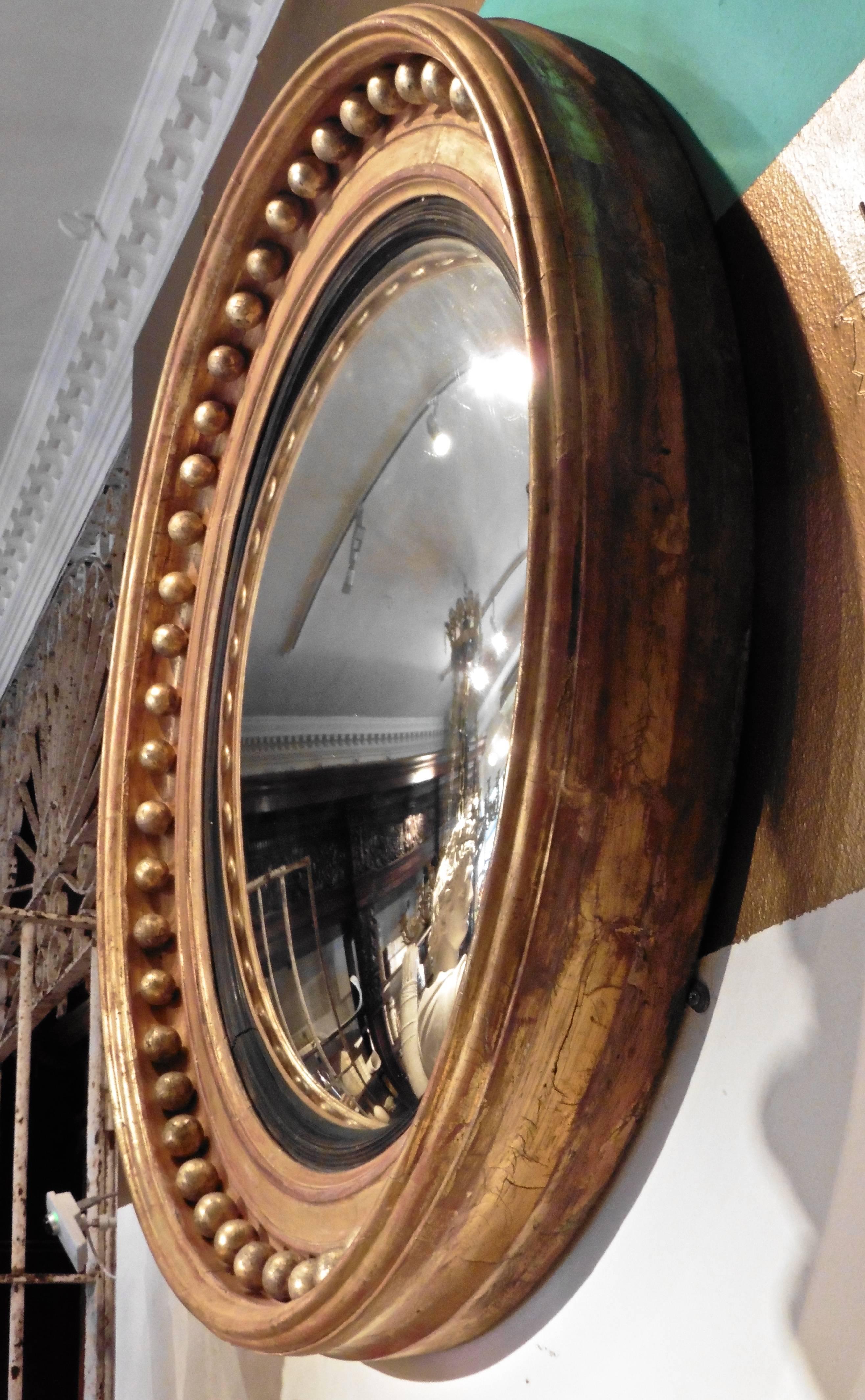 Early 19th Century Large English Regency Giltwood Framed Convex Mirror, circa 1820