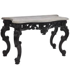Pair of Anglo-Indian Ebonized Rococo Consoles with Grey Marble Tops, circa 1900