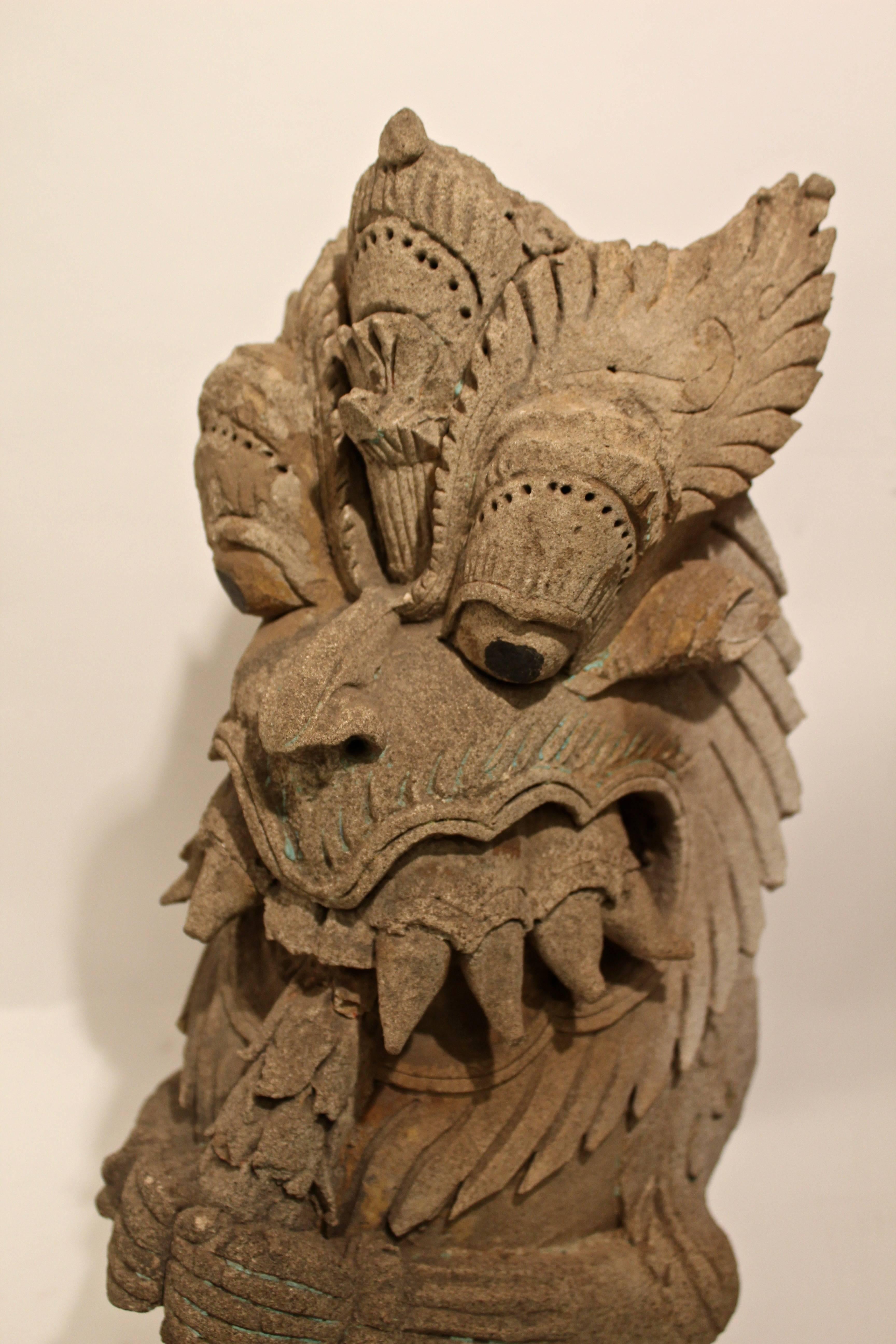 An Indian clay and stone Vyali from the 18th century on a later square Stand. Also known as a Yali, a Vyali is a mythical creature prominent in Hindu temples and Indian art, usually with the stylized body of a lion and the head of another creature,
