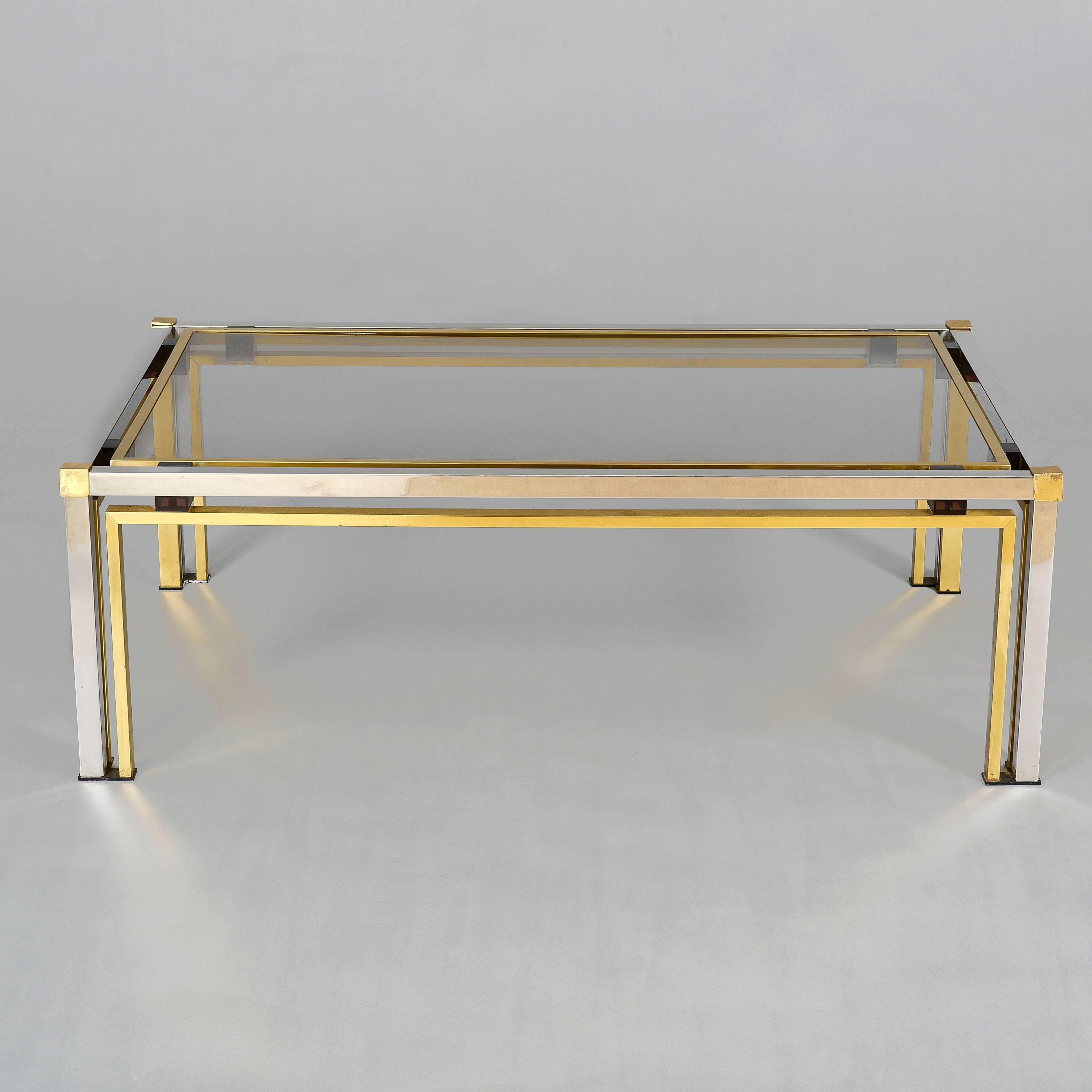 Elegant double-framed centre table in chrome and brass with smoked glass top.