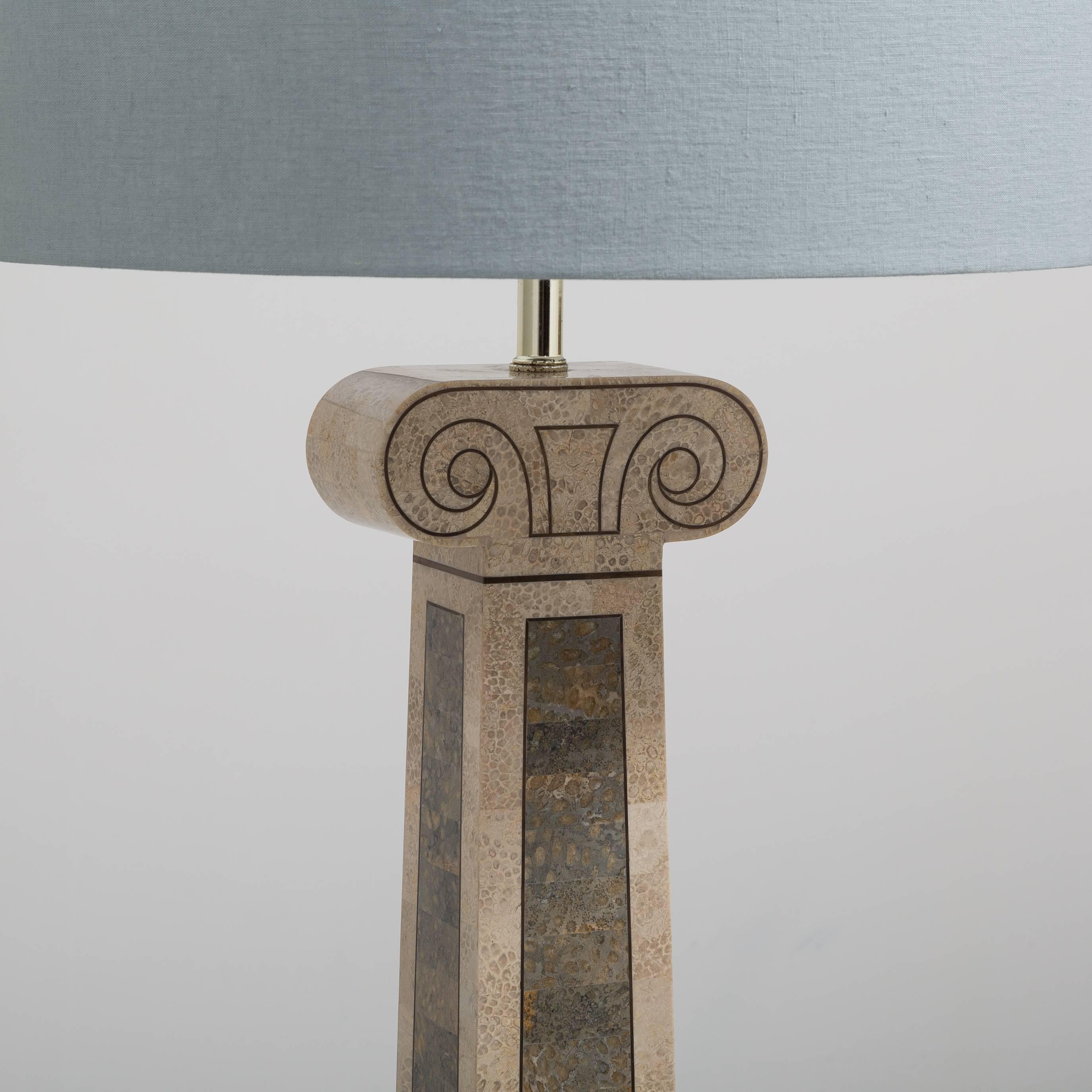 A Maitland Smith designed tessellated stone veneered ionic column floor lamp, 1980s. 