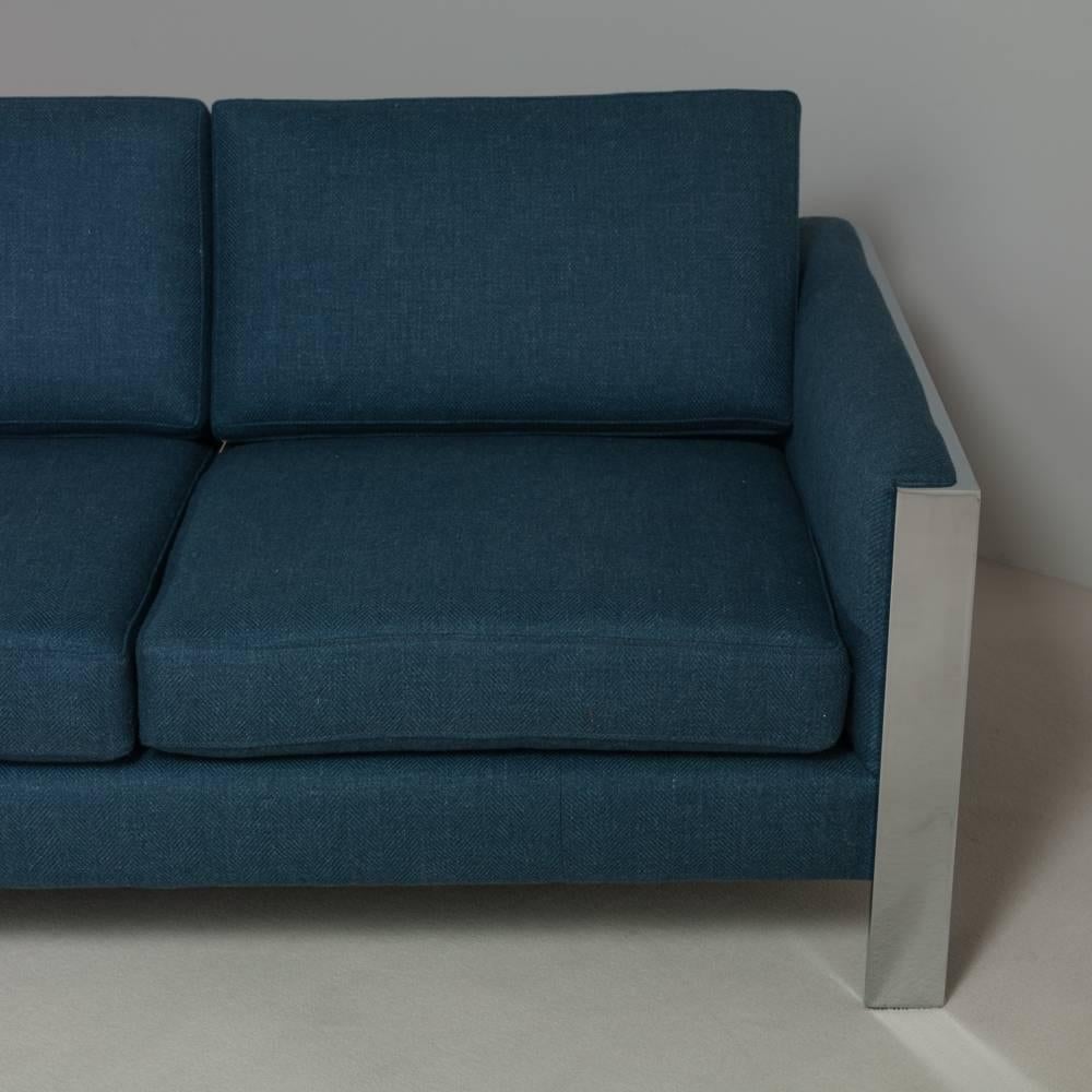 A large chromium steel framed teal wool upholstered sofa, 1970s fully reupholstered by Talisman

Price includes 20% VAT which is removed for items shipped outside the EU.