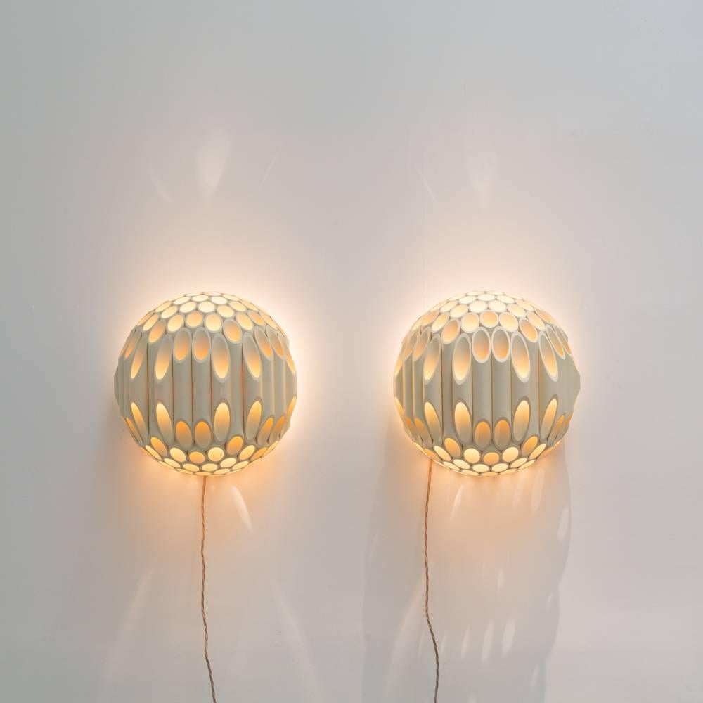 An exceptional and rare pair of spherical wall sconce by Rougier Canada, late 1970s

Although there is little documented about the Canadian designer Roger Rougier we know that their designs were produced between 1970-80. Most famously specialising