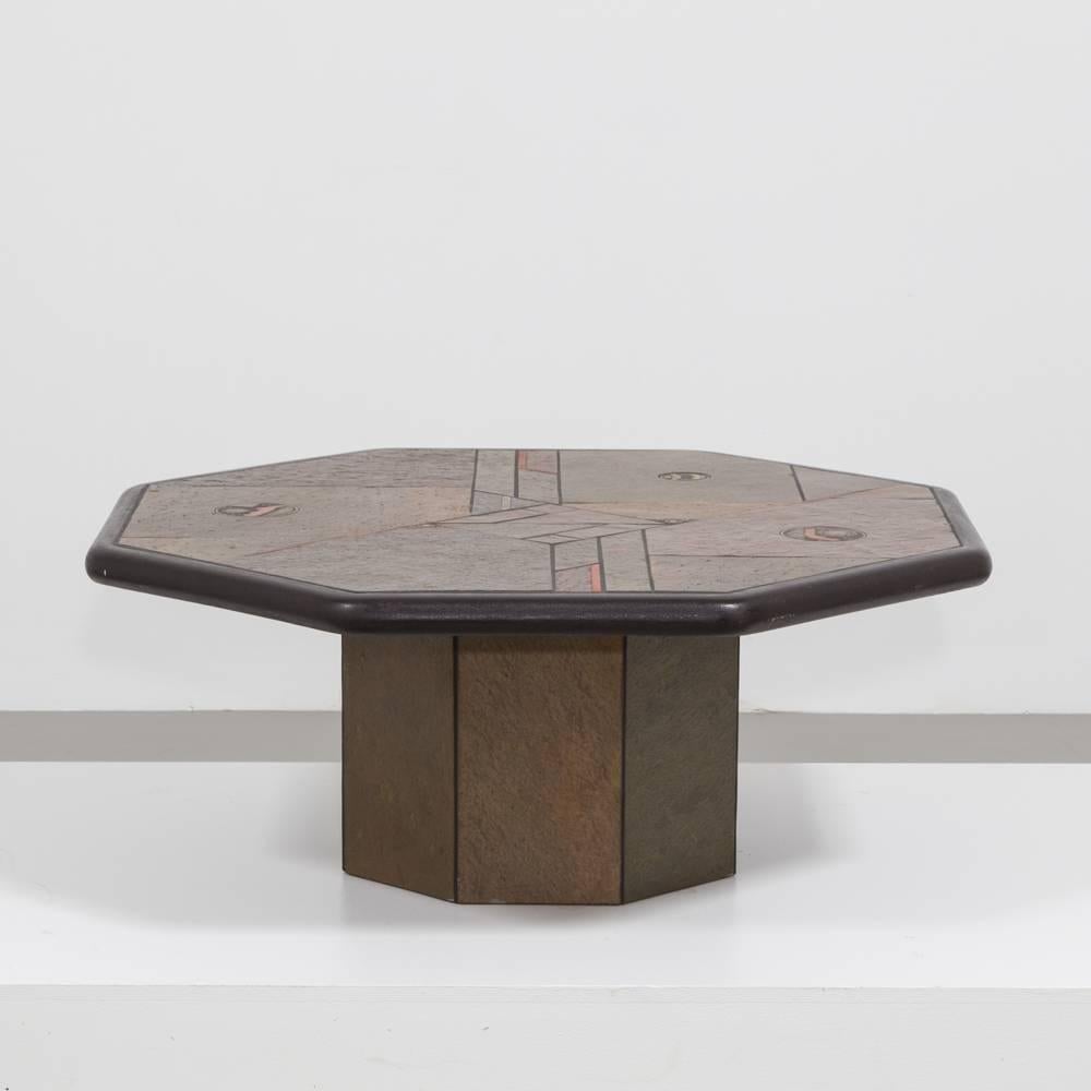 A Brutalist octagonal coffee table with colored slate detail by Paul Kingma, 1970s

Price includes 10% VAT which is removed for items shipped outside the EU.