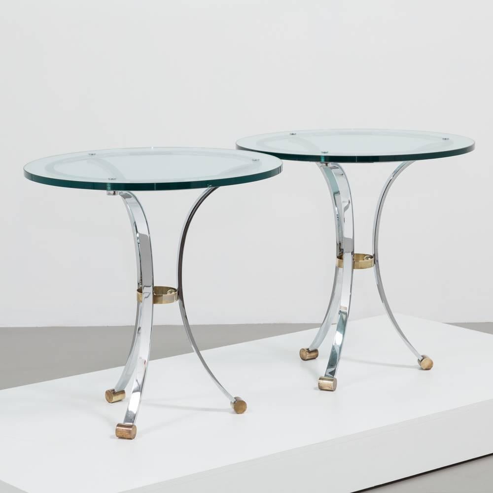 A pair of steel and brass side tables with glass tops by Maison Jansen, 1970s

Price includes 20% VAT which is removed for items shipped outside the EU.