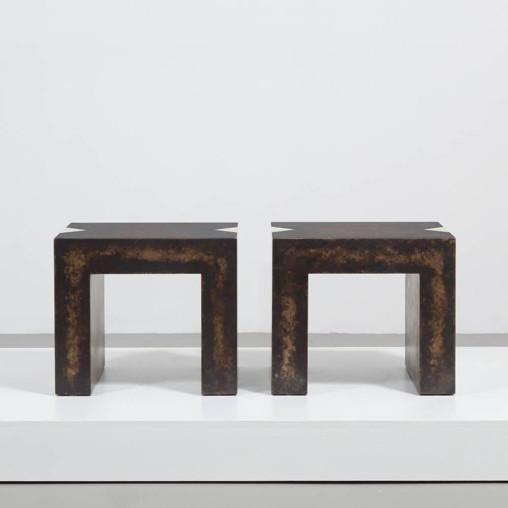 A pair of the rectangular bronze collection brass side tables by Talisman Bespoke.

The Bronze Collection is glamorous with an understated elegance. This finish is achieved with a specialised lacquer heavy in metallic particles which adds tonal
