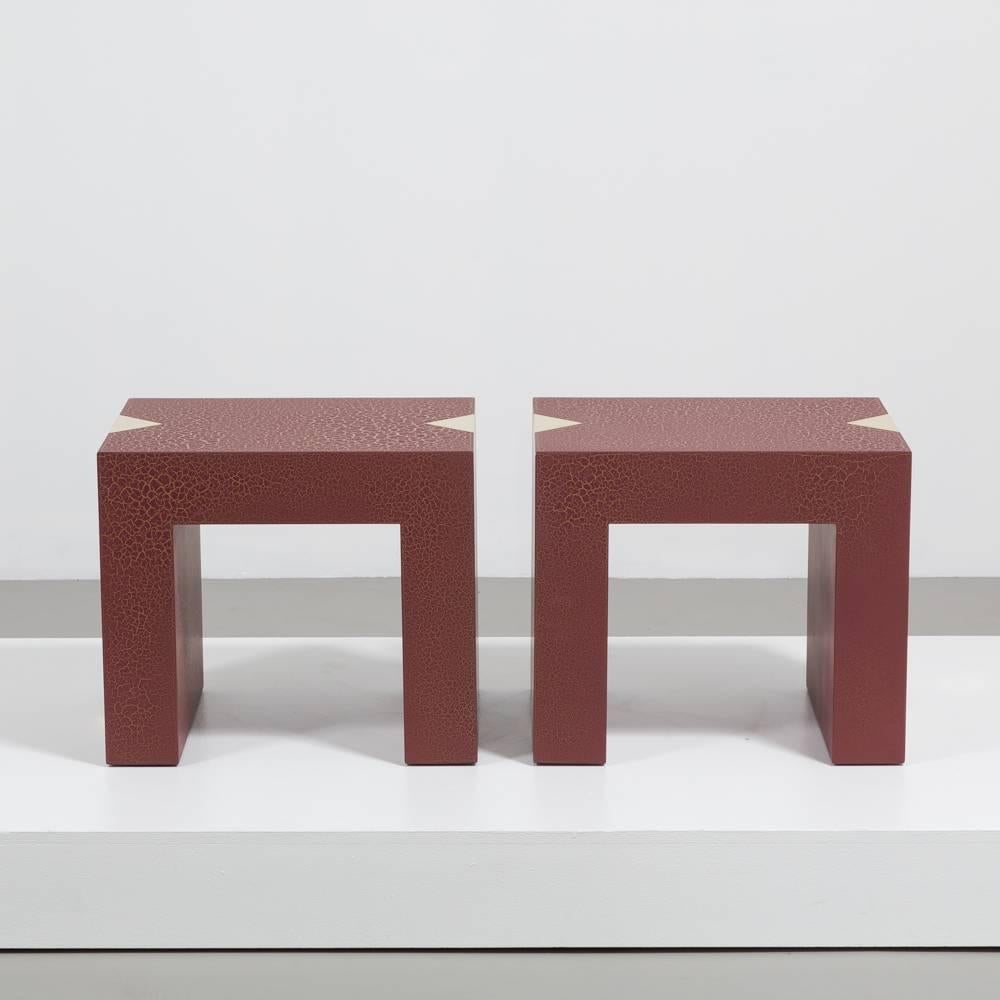 A pair of rectangular crackles side tables by Talisman Bespoke (burgundy and gold).

The Talisman team and workshop bring a modern flourish to a traditional technique via a process of layering paint and varnish, resulting in a superb textured