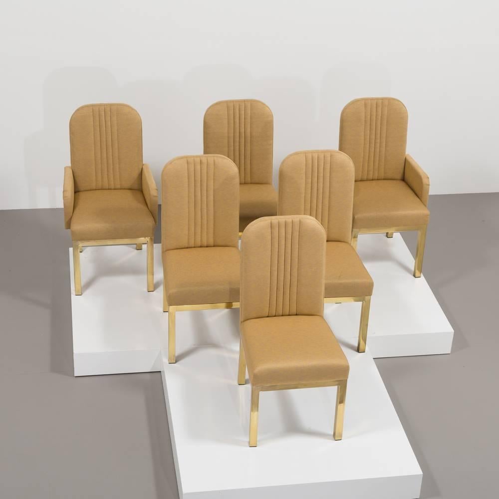 A set of six Mastercraft designed brass legged dining chairs fully upholstered by Talisman. The set includes two carvers. 1970s

Mastercraft is synonymous with high style and high society living from mid to late 20th century. The American based
