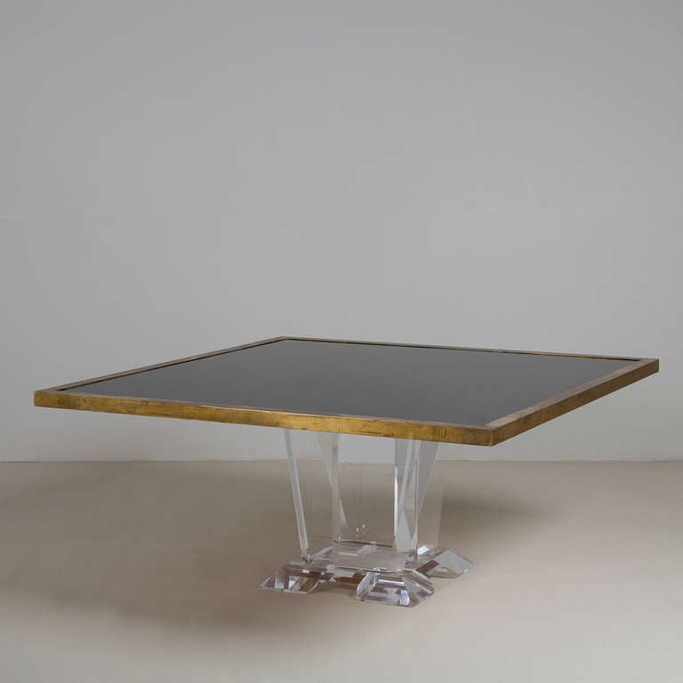 Superb crackle glass and brass framed dining table on a heavy Lucite base, 1980s




 