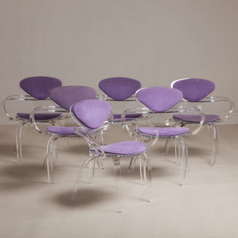 Stunning set of six Lucite framed 'pretzel' dining chairs with lilac seat and back pads based upon the Norman Cherner original plywood chair, 1980s.
 