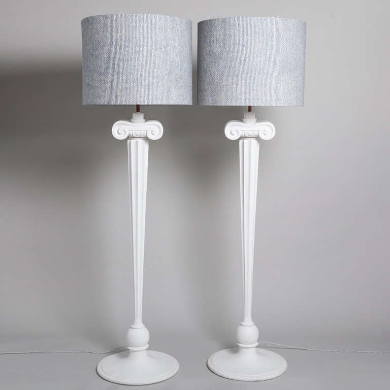 Pair of white hand painted floor lamps carved to look like columns and accompanied with linen shades, removed from the Eden Roc Hotel 1980s.

The lamps were designed by Diamond & Baratta for the Eden Roc Hotel in Miami Beach. The hotel was