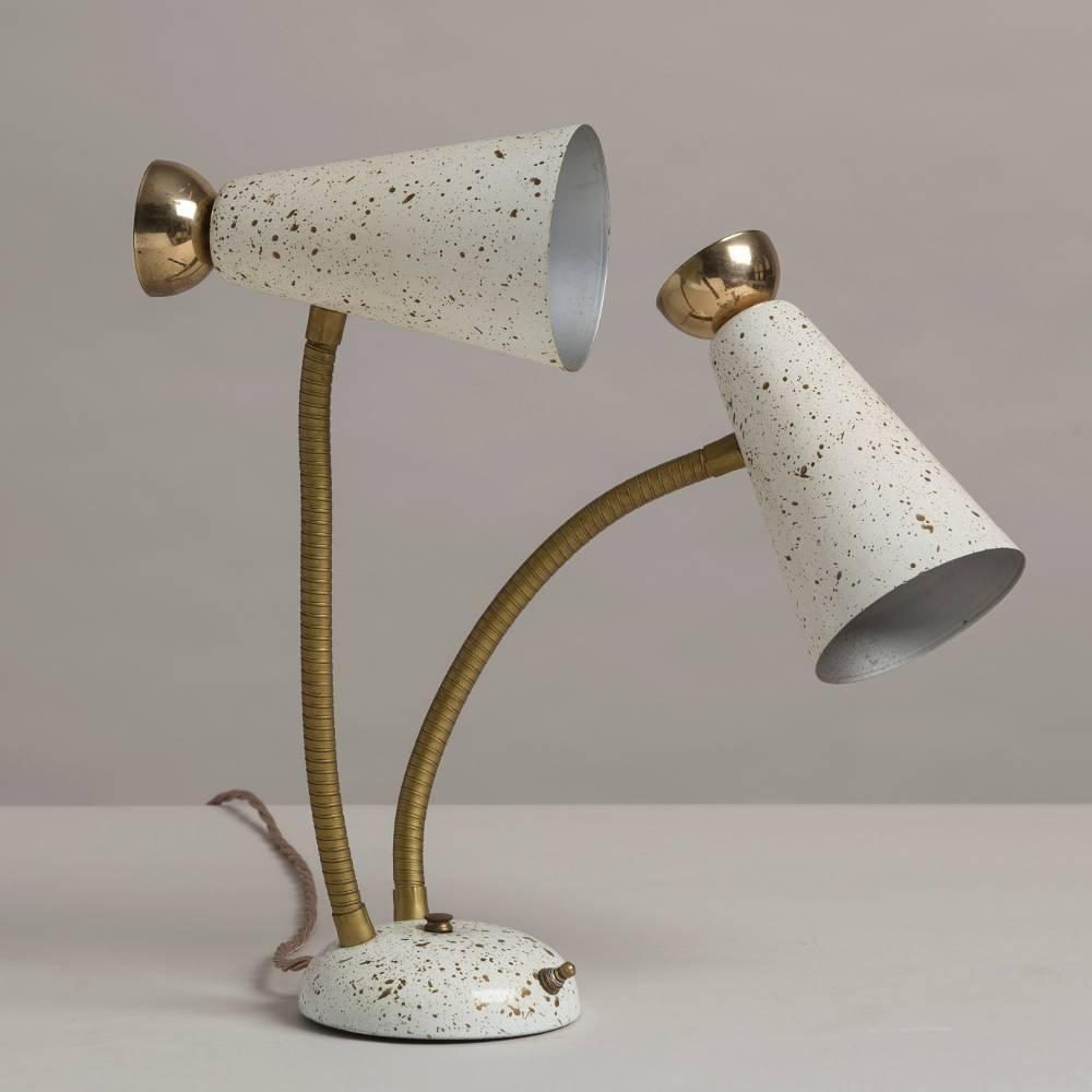 An atomic Spage Age double cone articulated desk lamp, 1950s

NB: These items are subject to a further discount over and above the trade when exported outside the EU of 20%.